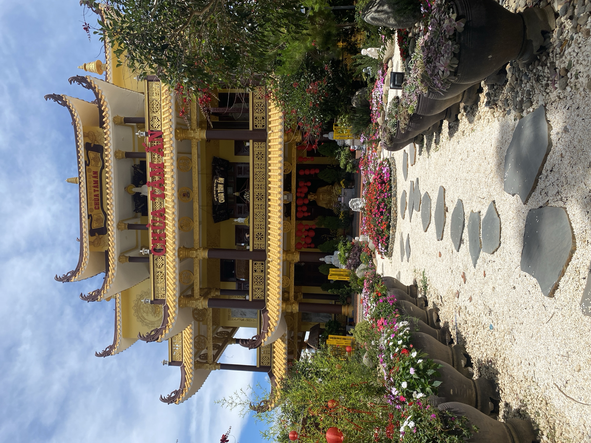 Buddhist temple with golden facade documented in Da Lat