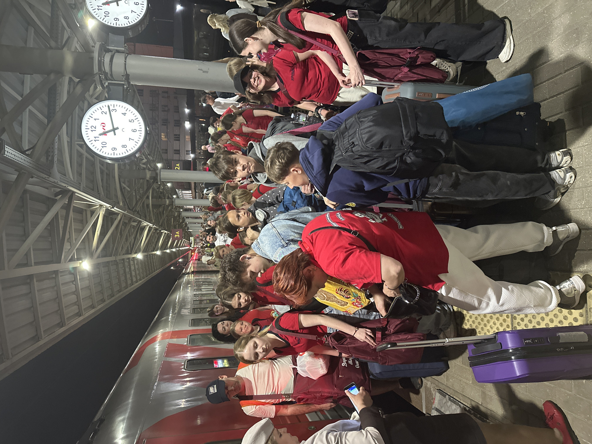 Youth group in red shirts gather at Nizhny Novgorod station