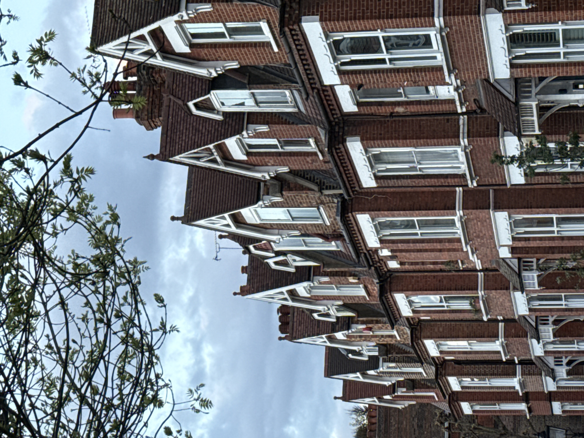 Victorian terraced houses with decorative features documented in London