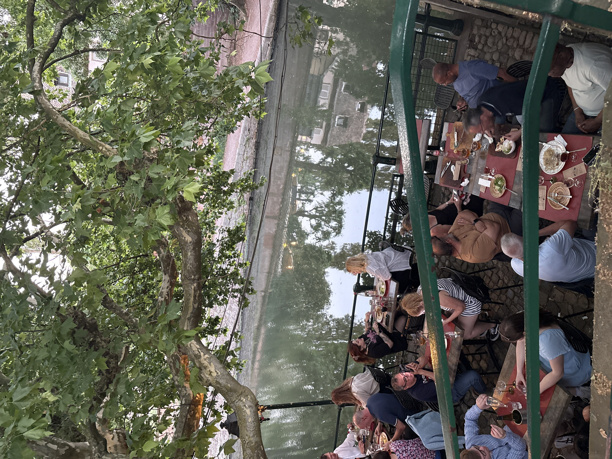 Canal-side diners enjoy evening meal in Strasbourg