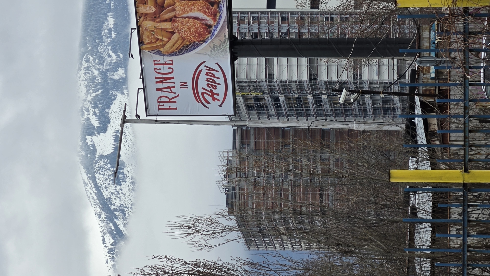 Morning scenes in Sofia: billboard advertising, decorated pancakes