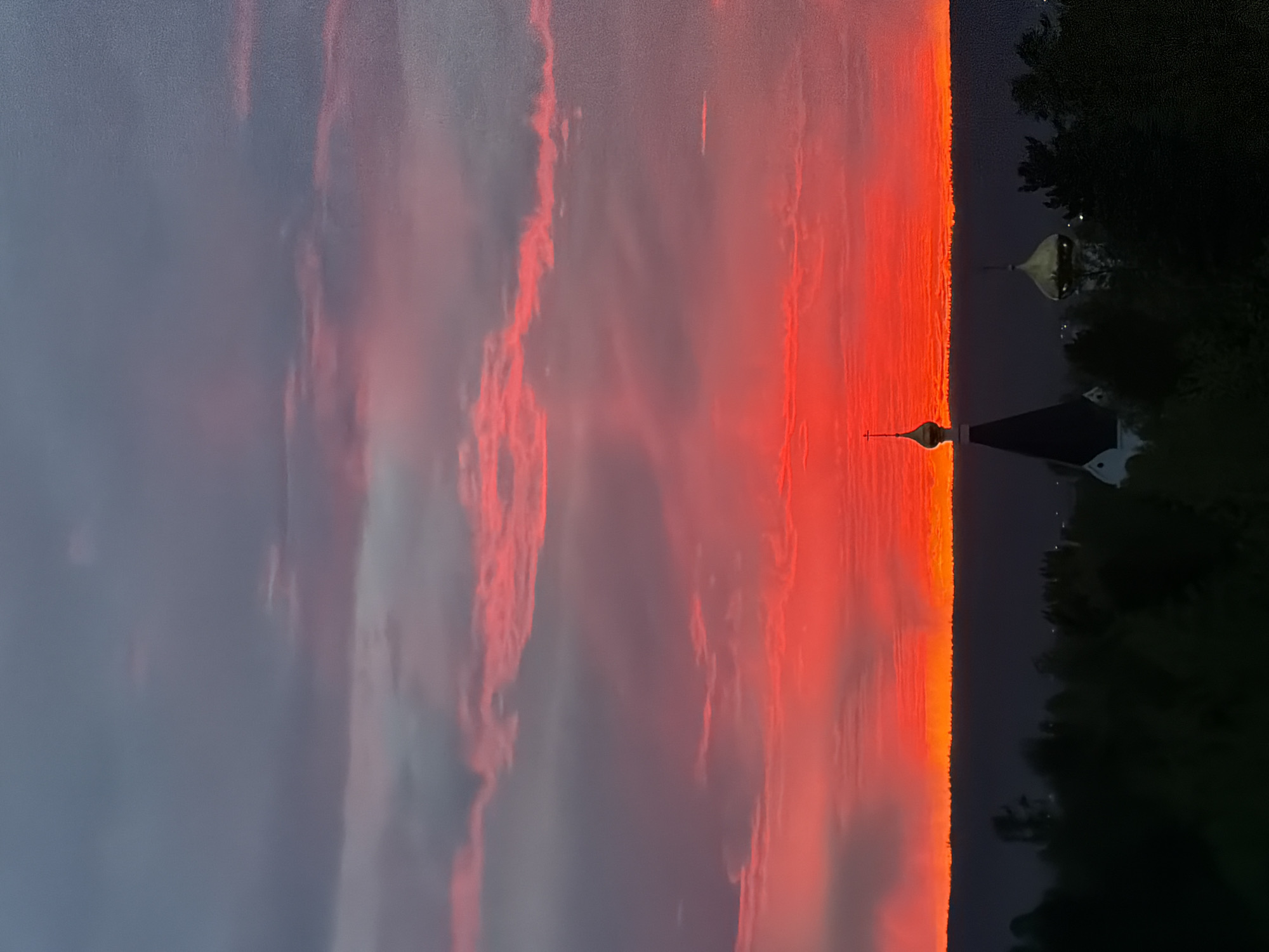 Sunset observed over water in Ust-Ilimsk, Russia