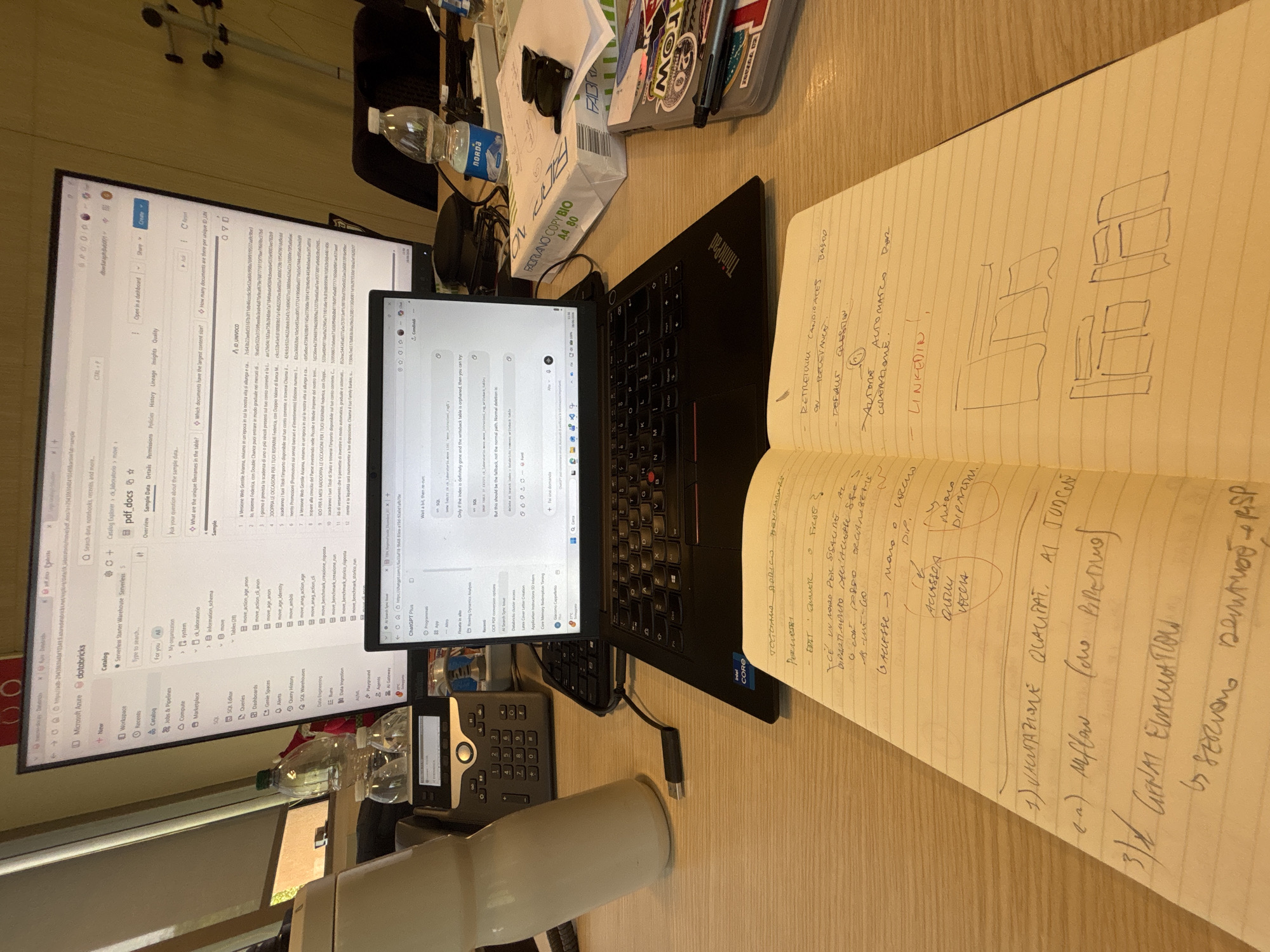 ChatGPT and Databricks running side by side at a work desk