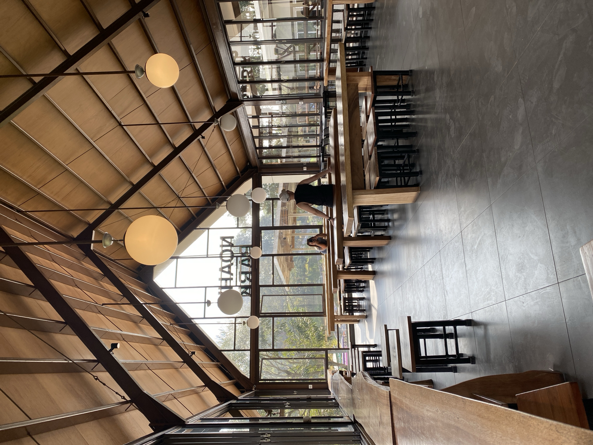 Matcha dessert and airy cafe interior in Kayuambon