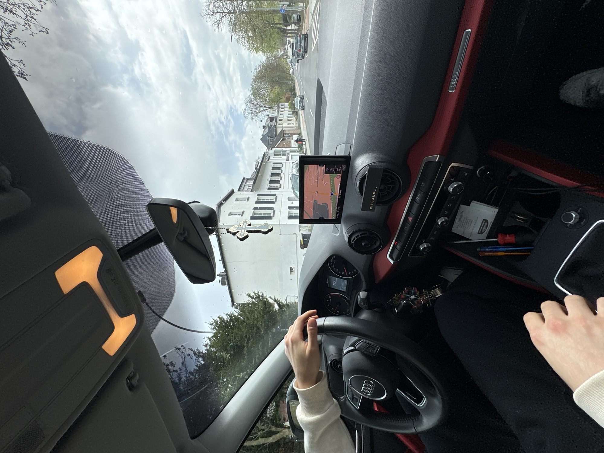 Driver navigates Mönchengladbach streets with GPS guidance