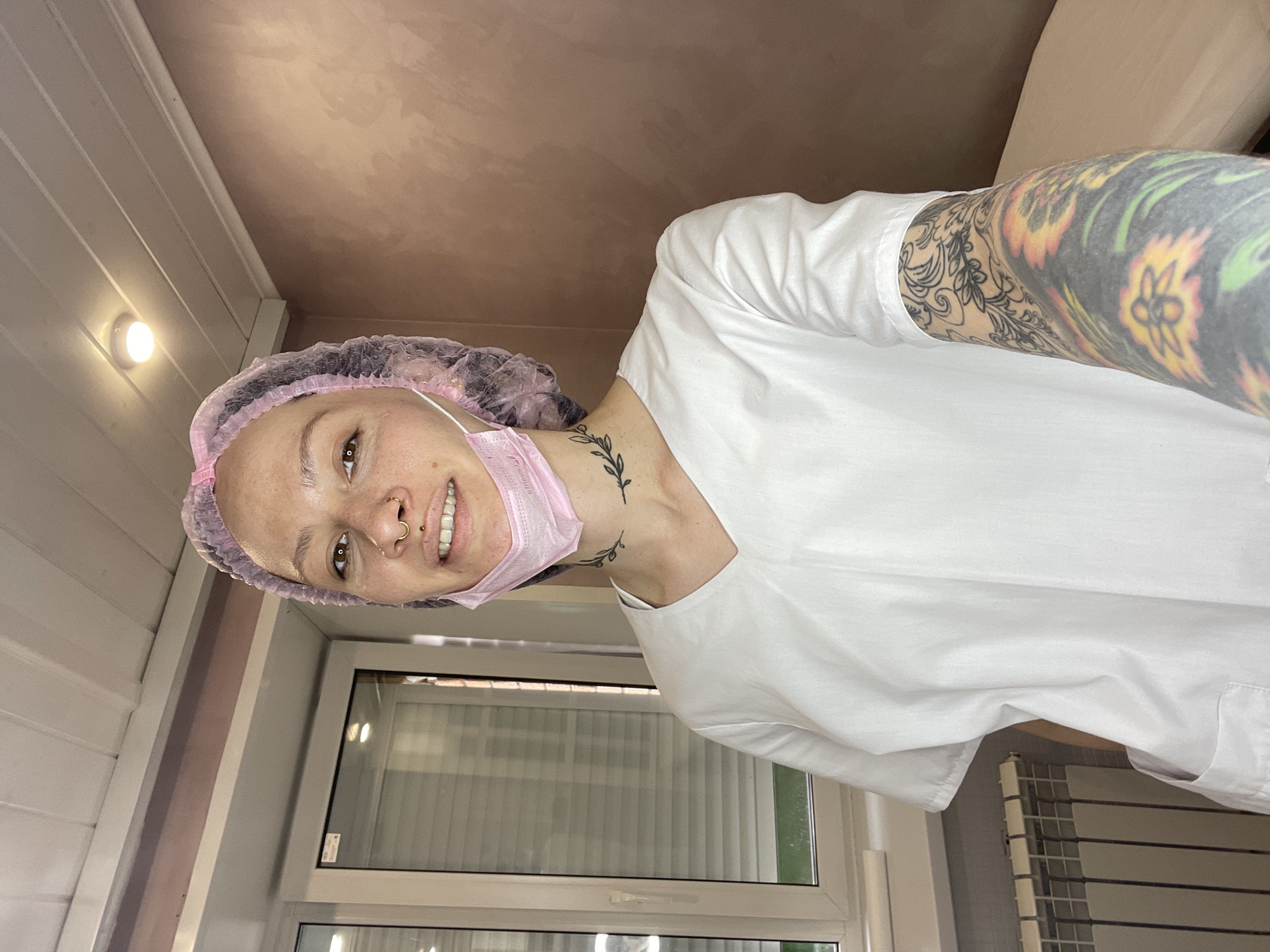 Tattooed healthcare worker photographed at Izhevsk medical facility