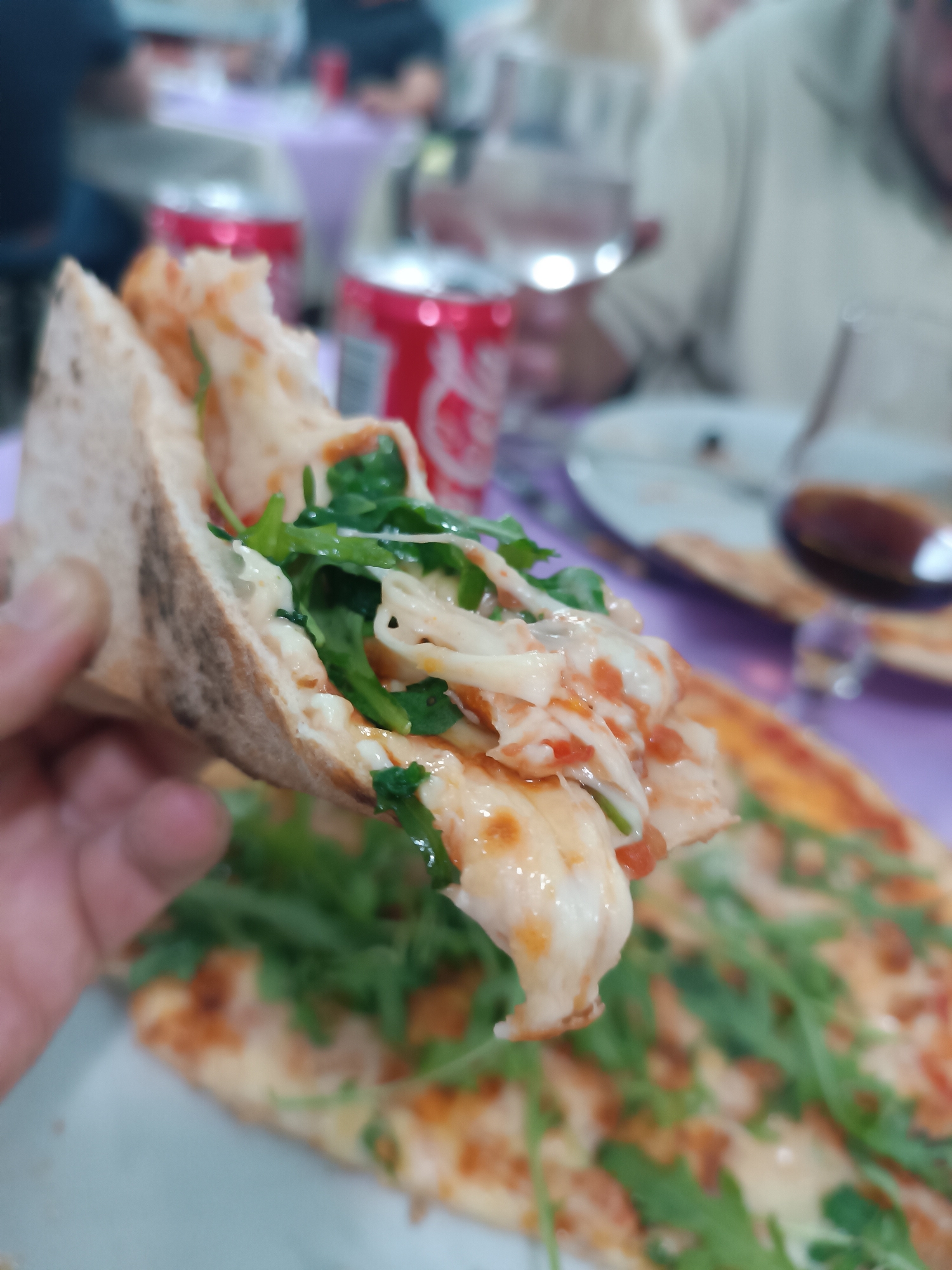 Evening pizza dining documented at Pomponesco pizzeria