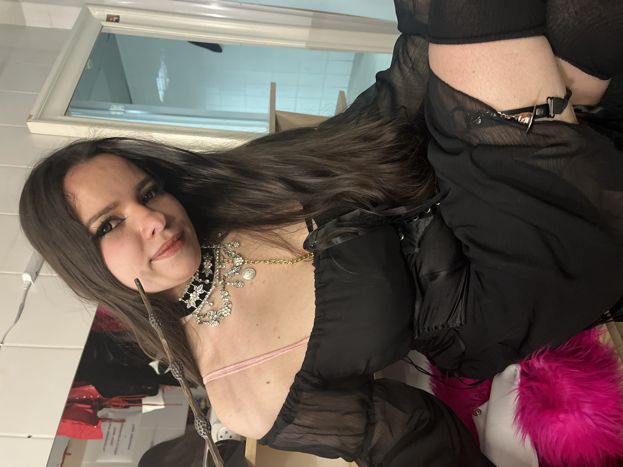 Woman photographed indoors at unknown location early Sunday morning