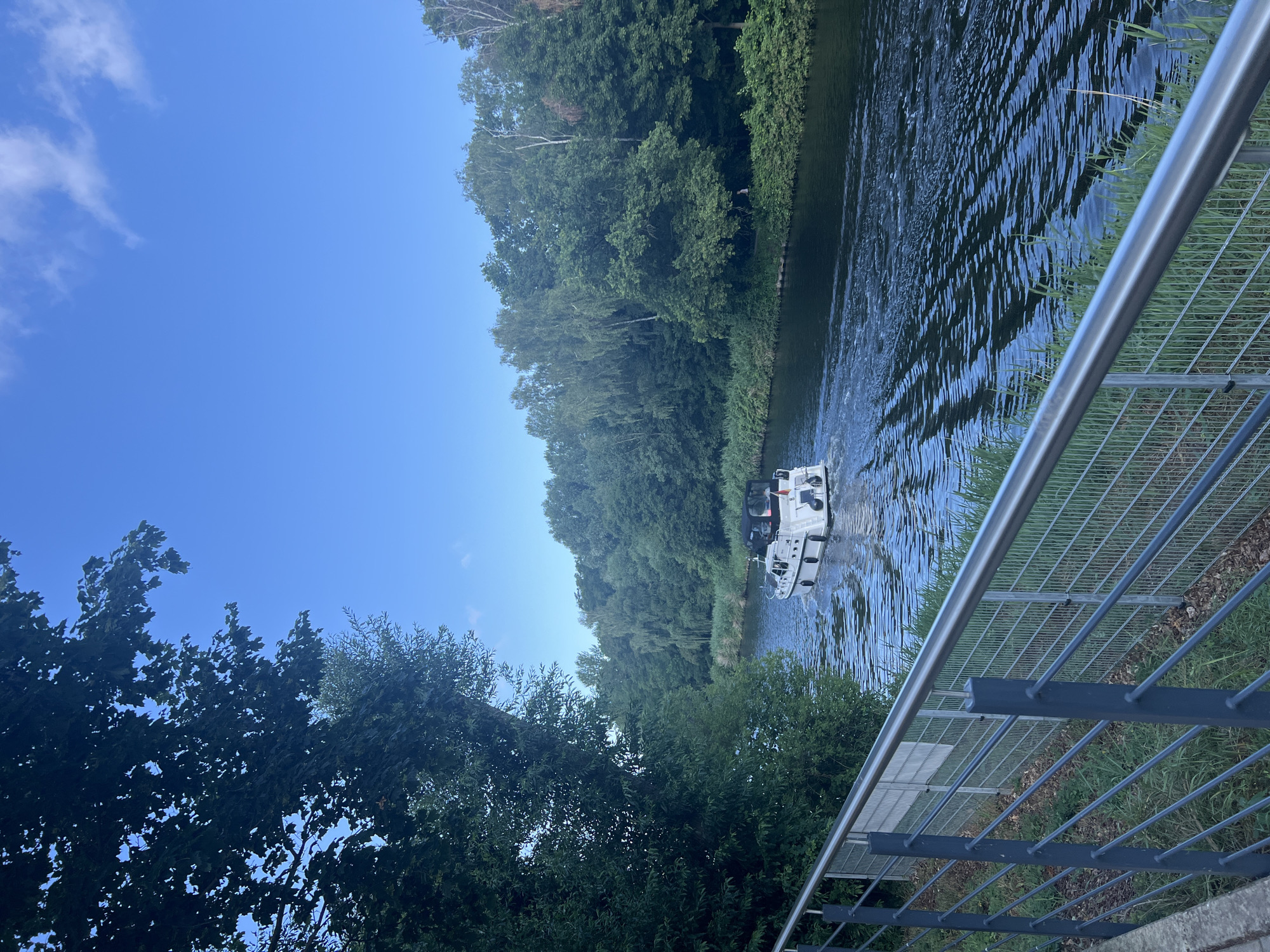 Morning on the Teltow canal: yacht cruising, workout wrapping up