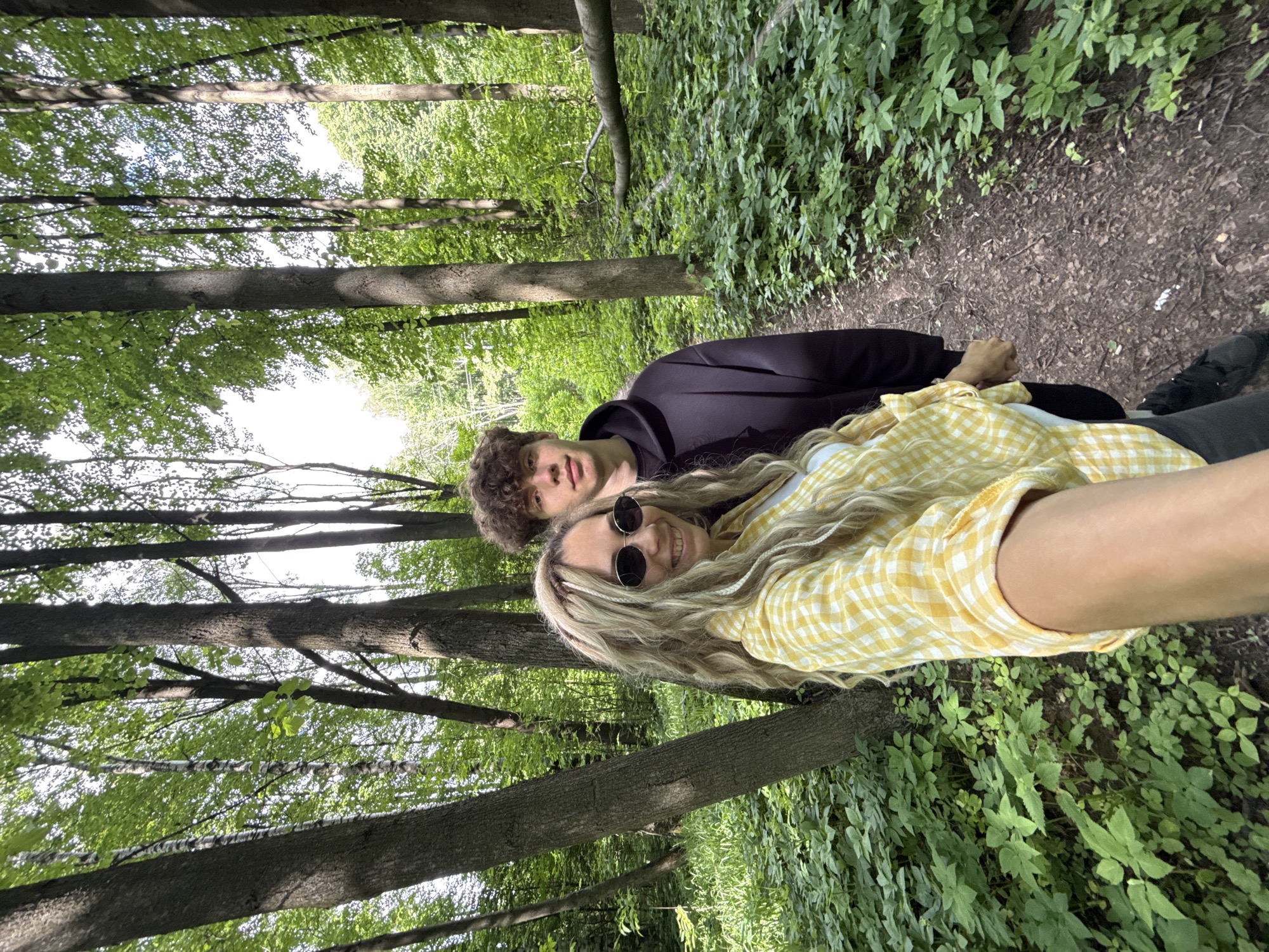 Two youths photographed in forest near Rusanovo, Russia