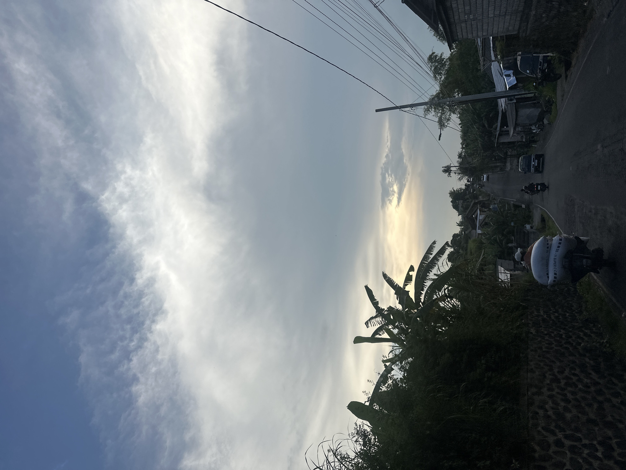Street scene captured in Sibanggede, Indonesia during cloudy day