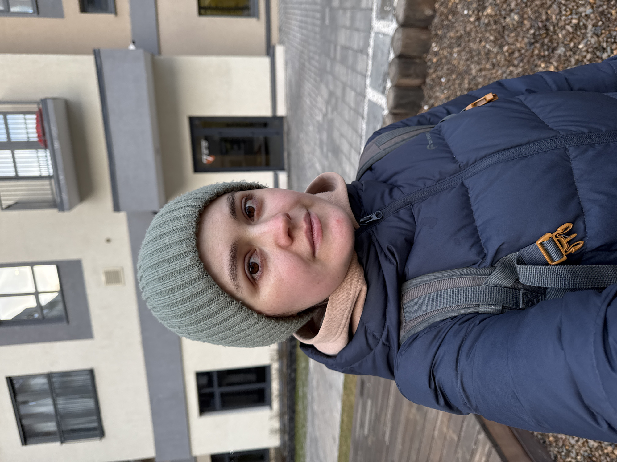 Family playground outing documented in Izhevsk on overcast afternoon