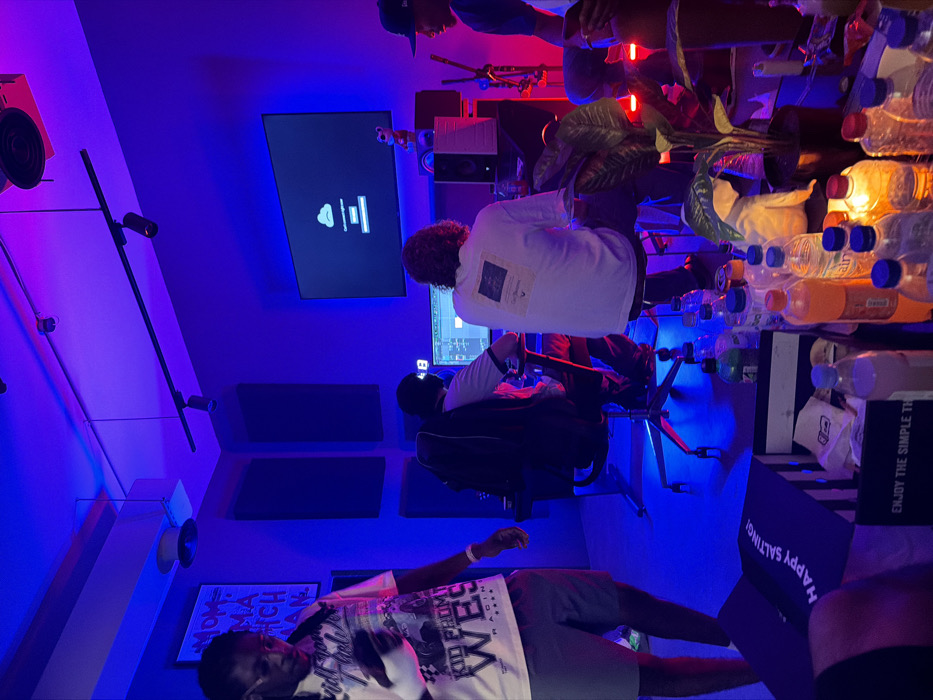 Two men work computers in Dubai creative space