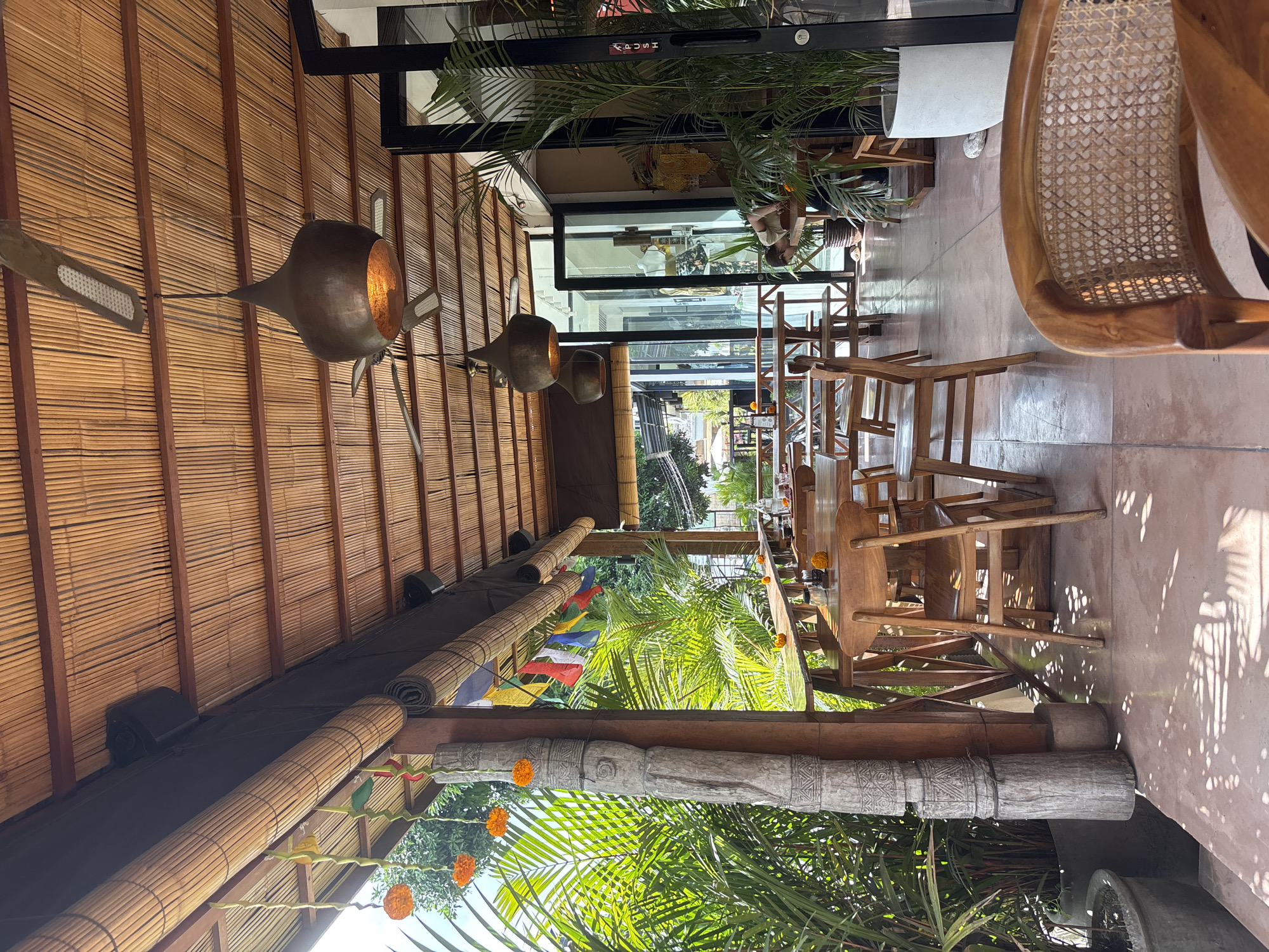 Late-night documentation of bamboo restaurant interior in Kuta Selatan