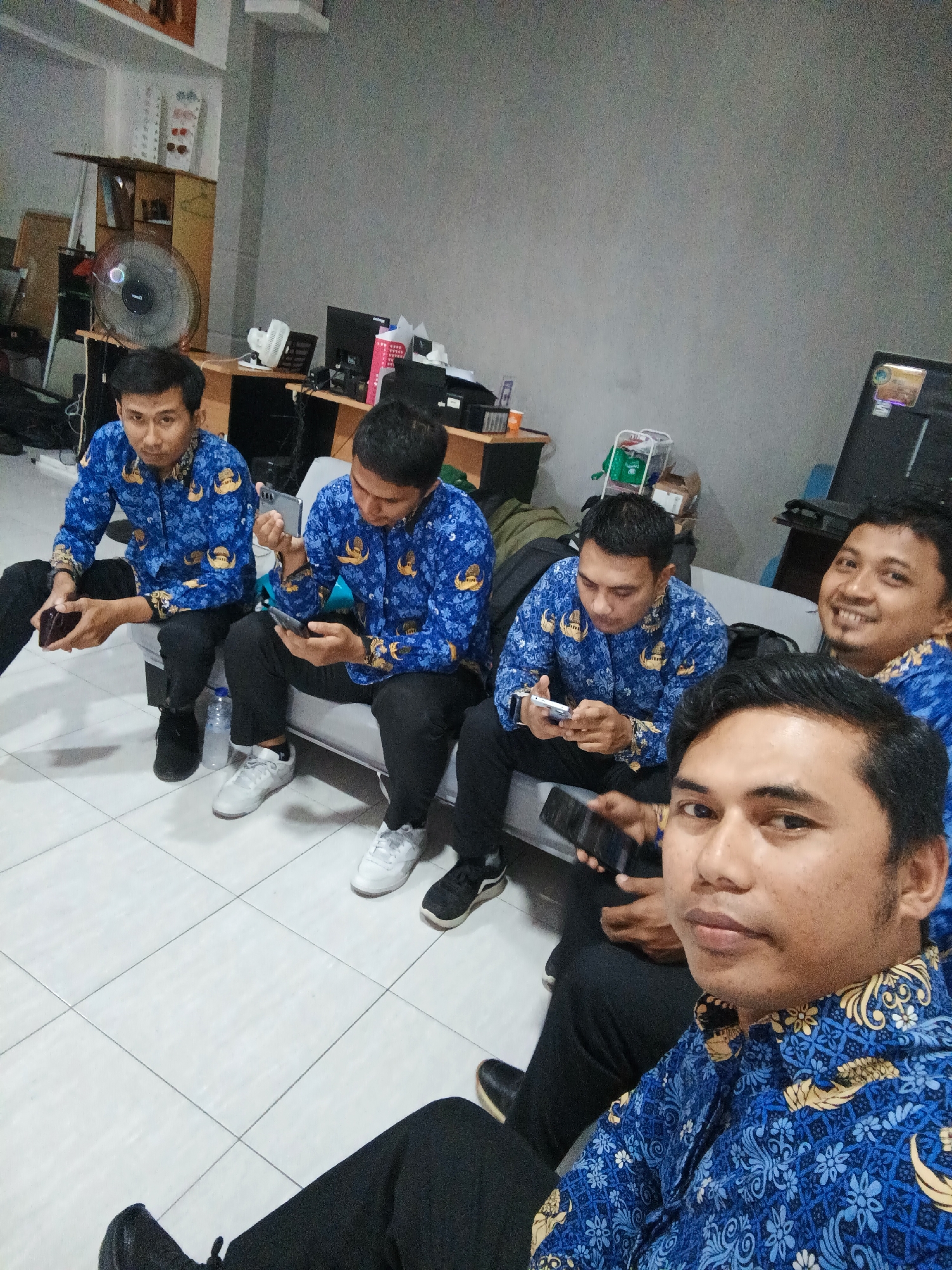 Uniformed group visits photography studio in Gorontalo