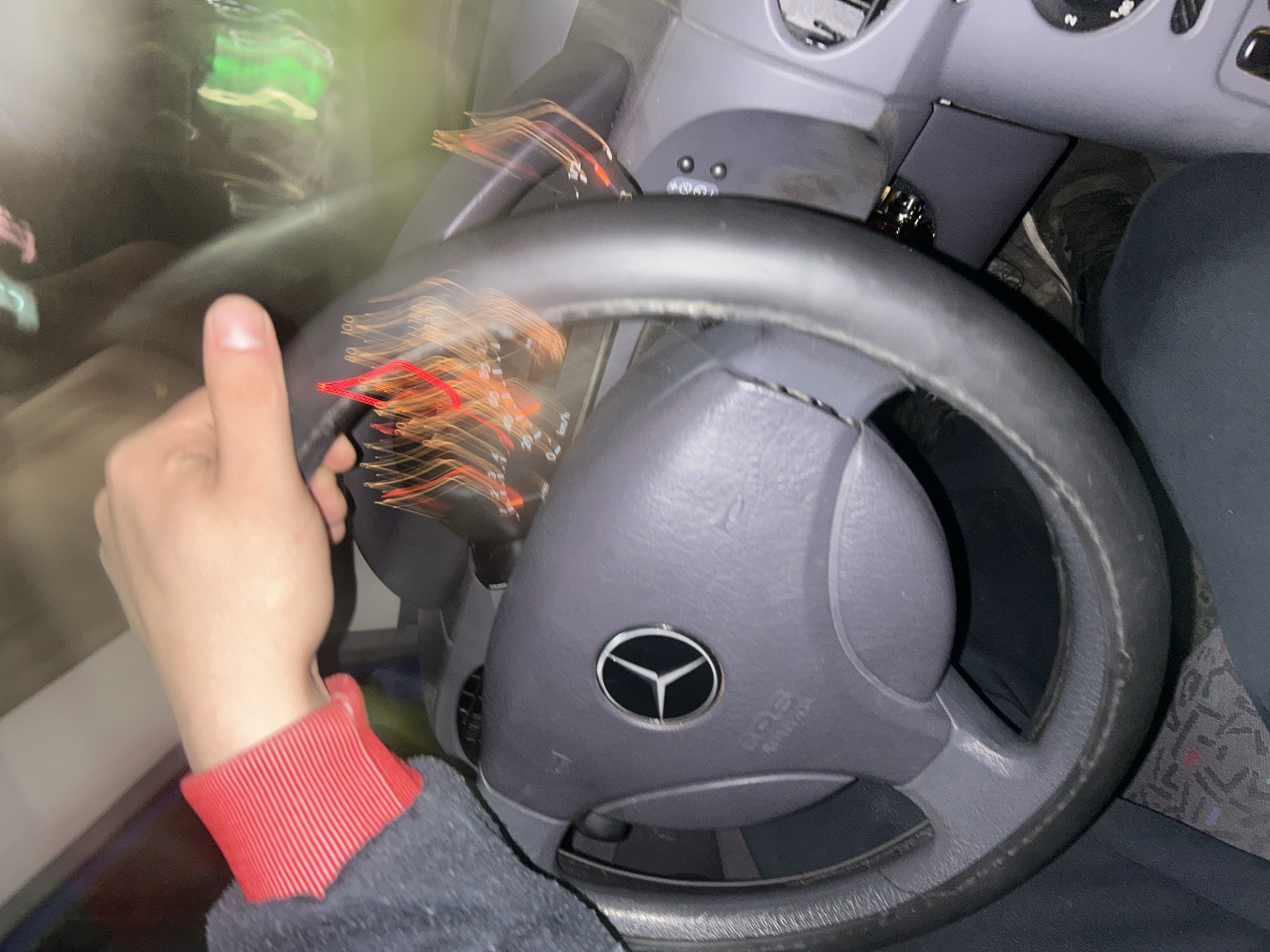 Driver photographed inside Mercedes-Benz vehicle in Pazardzhik, Bulgaria