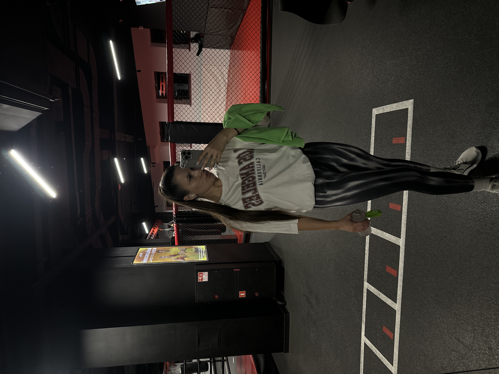 Woman documents workout session at Vniissok gym facility