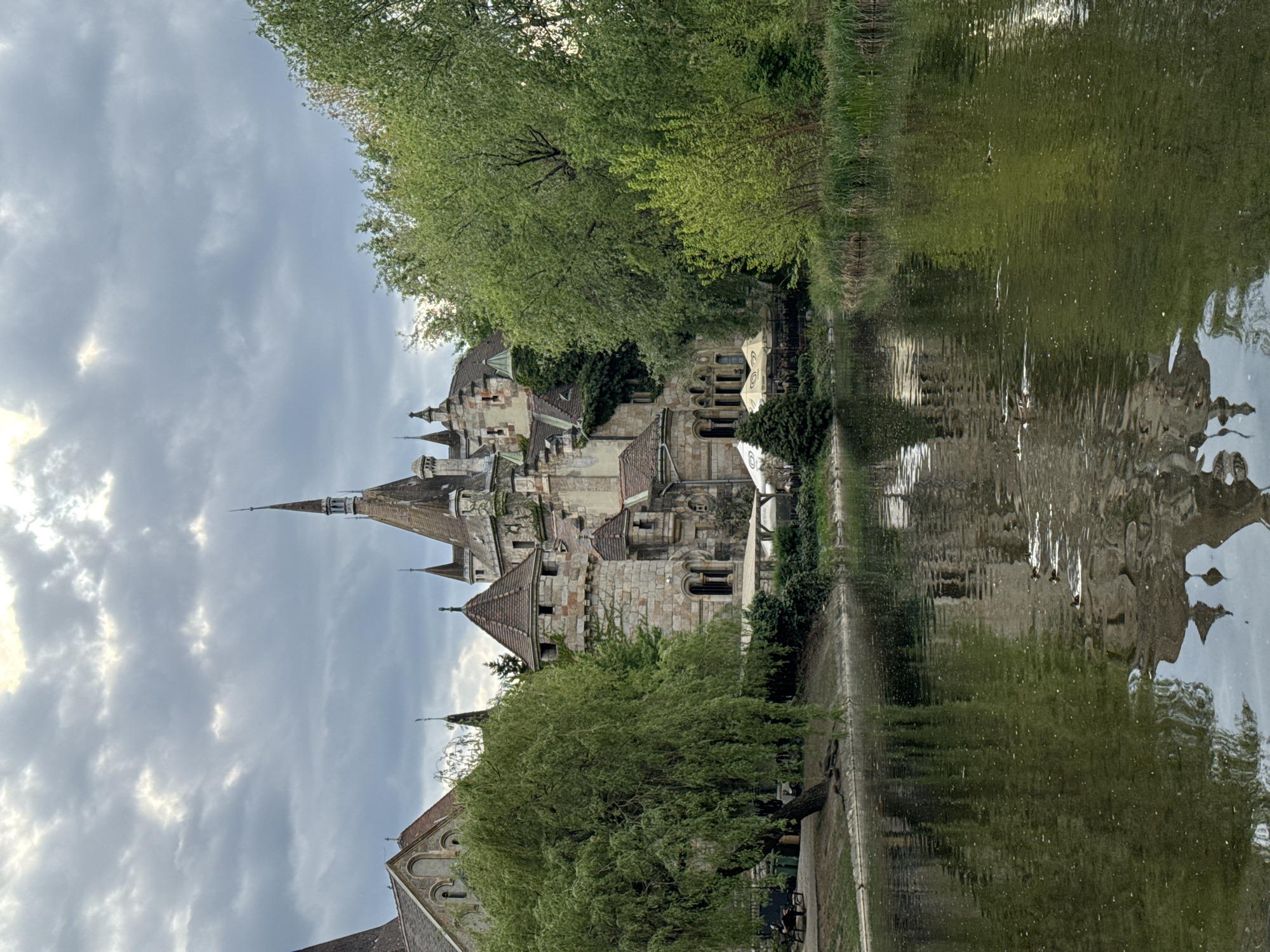 Vajdahunyad Castle photographed with reflection in Budapest's City Park