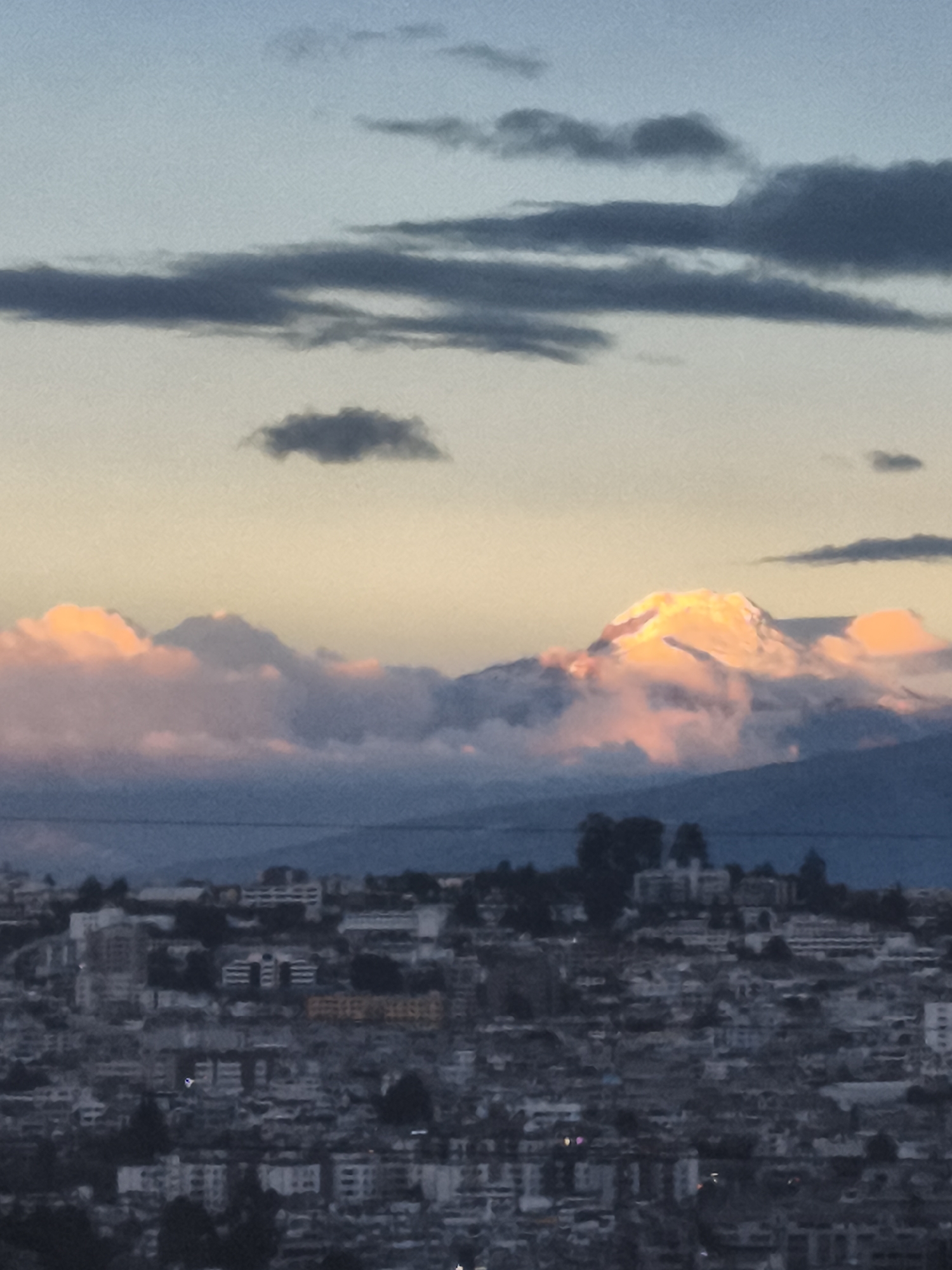Sunset views captured over Quito's mountain cityscape