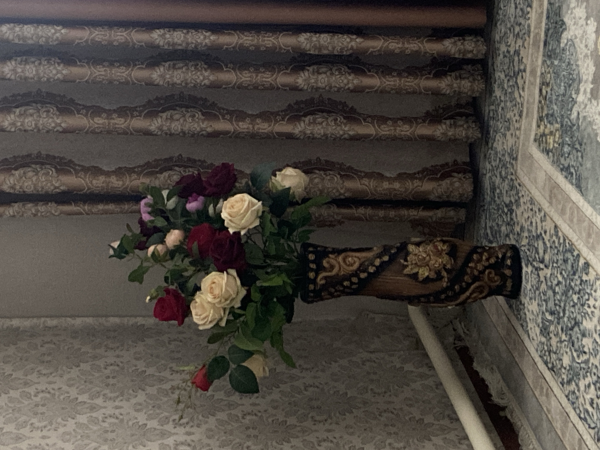 Decorative flower arrangement observed in Bishkek home setting