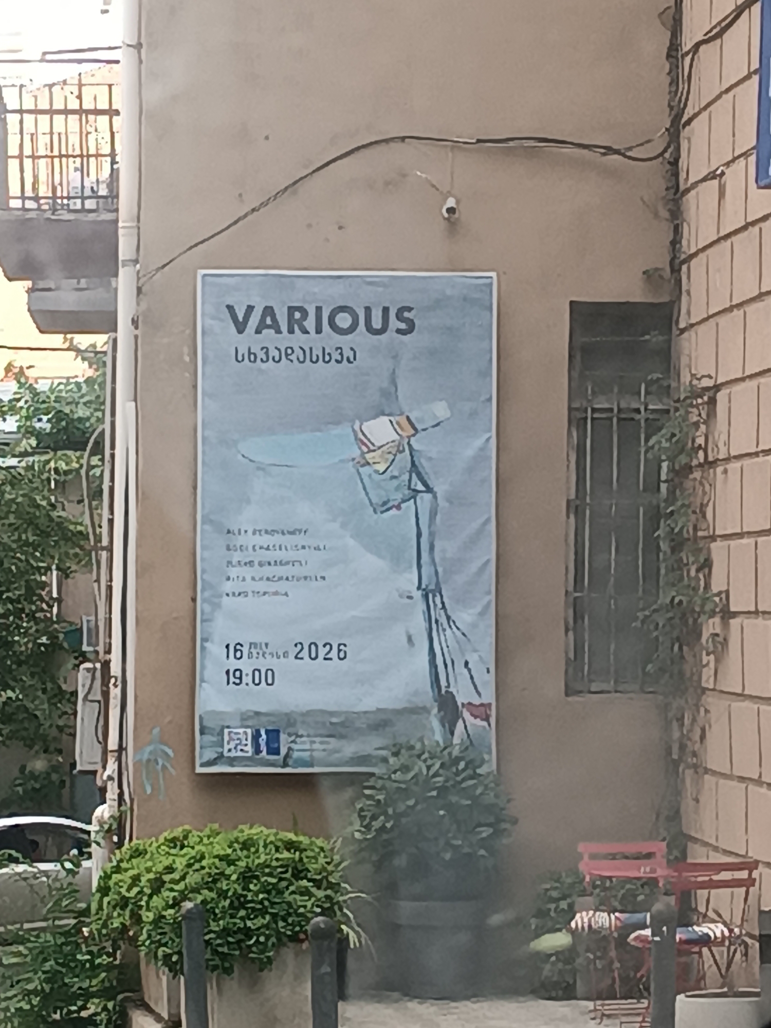 Street-level details from Tbilisi: architecture, public art, and signage