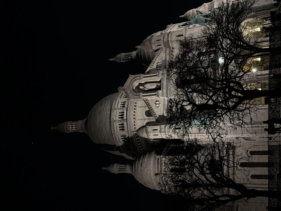 Evening gatherings near Sacré-Cœur captured in fragmented Paris memories