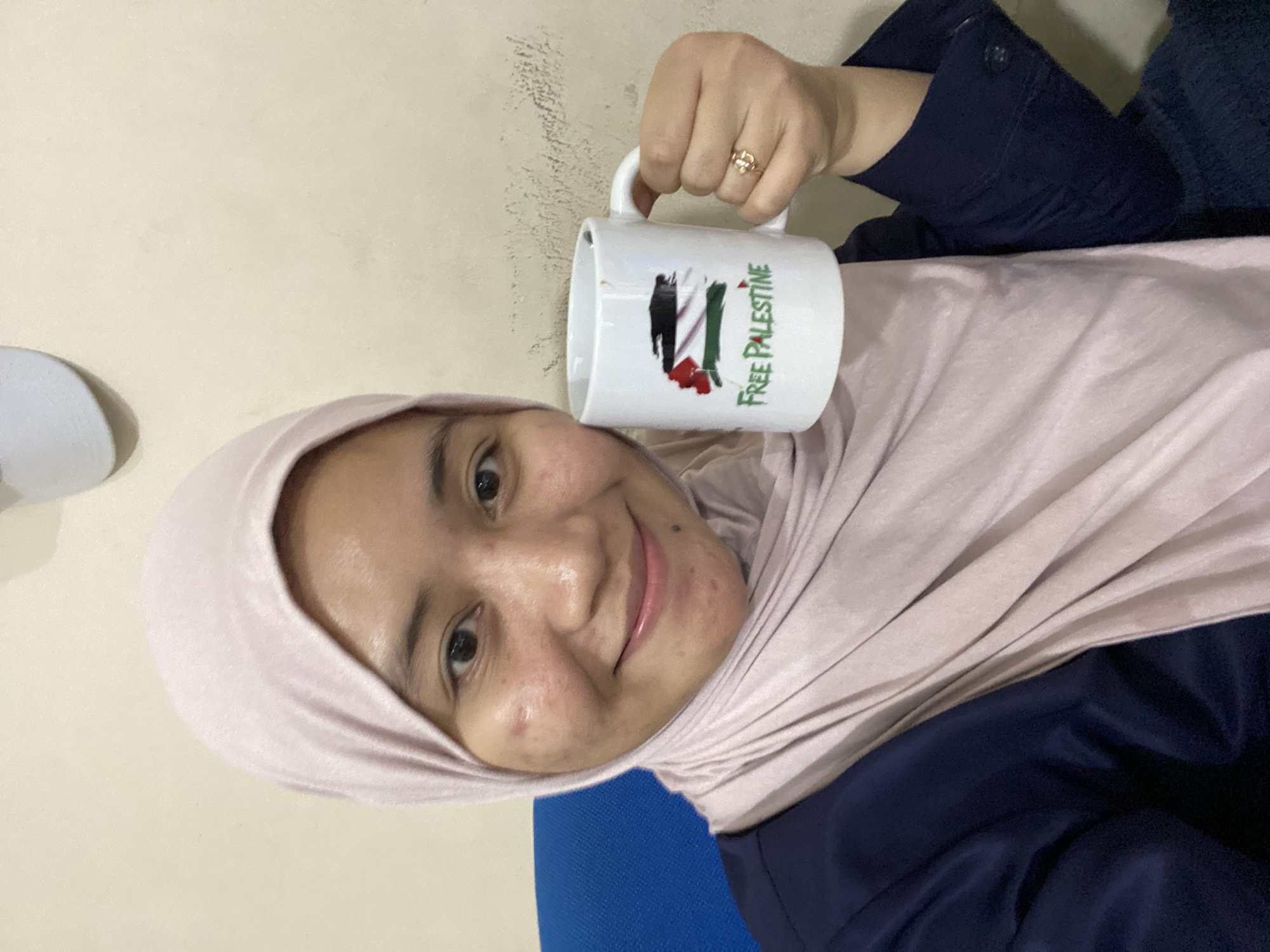 Morning at a Banjarbaru school, with a Free Palestine mug front and center