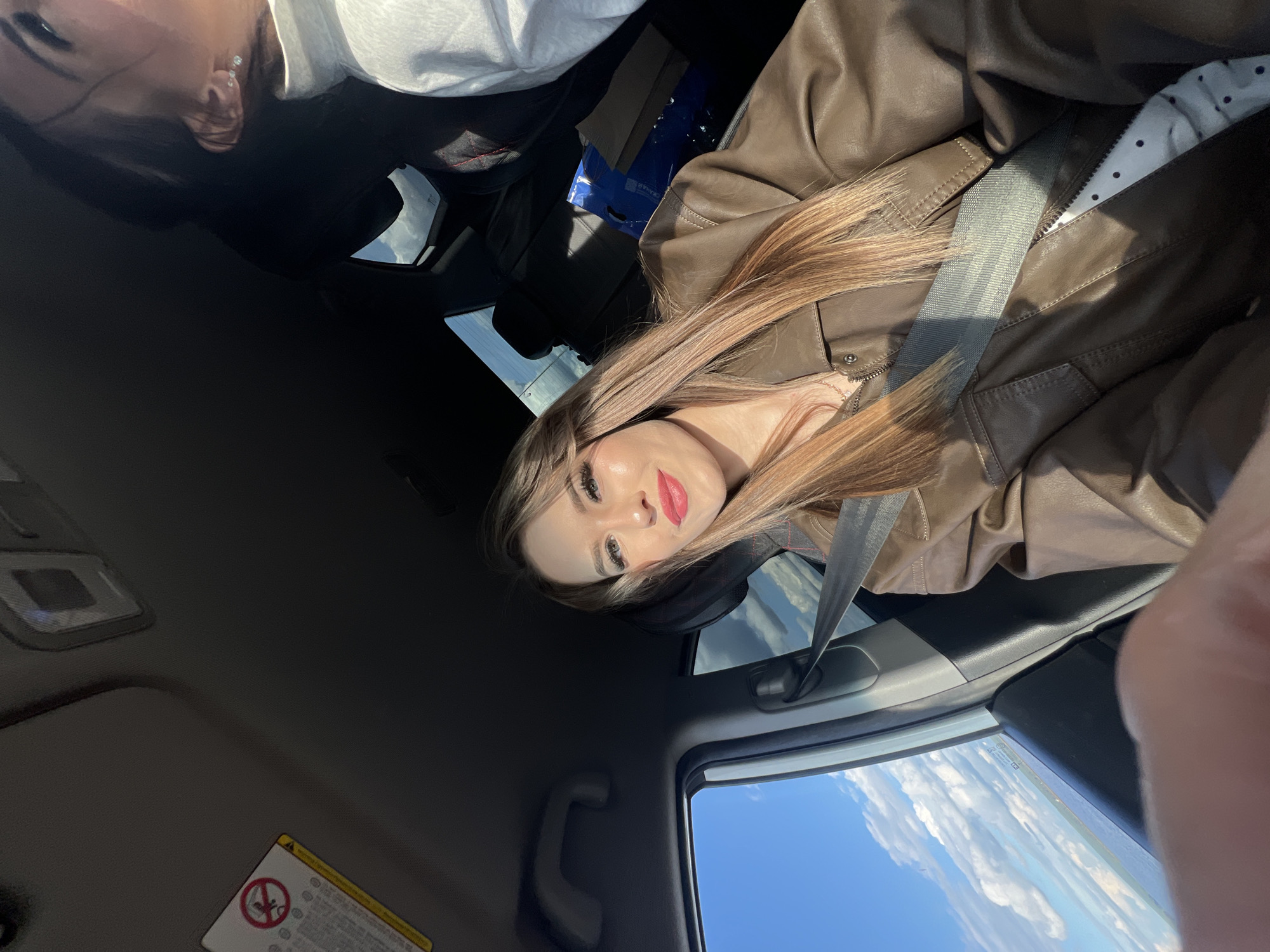 Afternoon car journey captures Chaikovsky waterfront and city views
