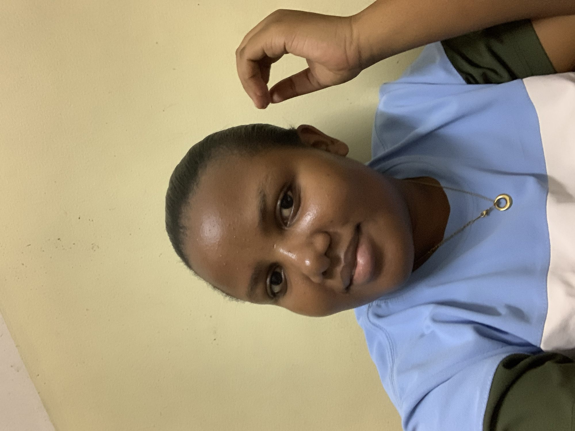 Woman poses for photos in Dar es Salaam residence