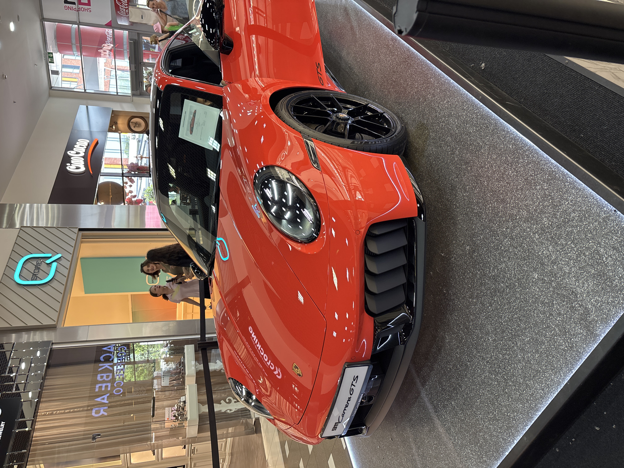 Porsche 911 showroom display at a Chișinău shopping mall