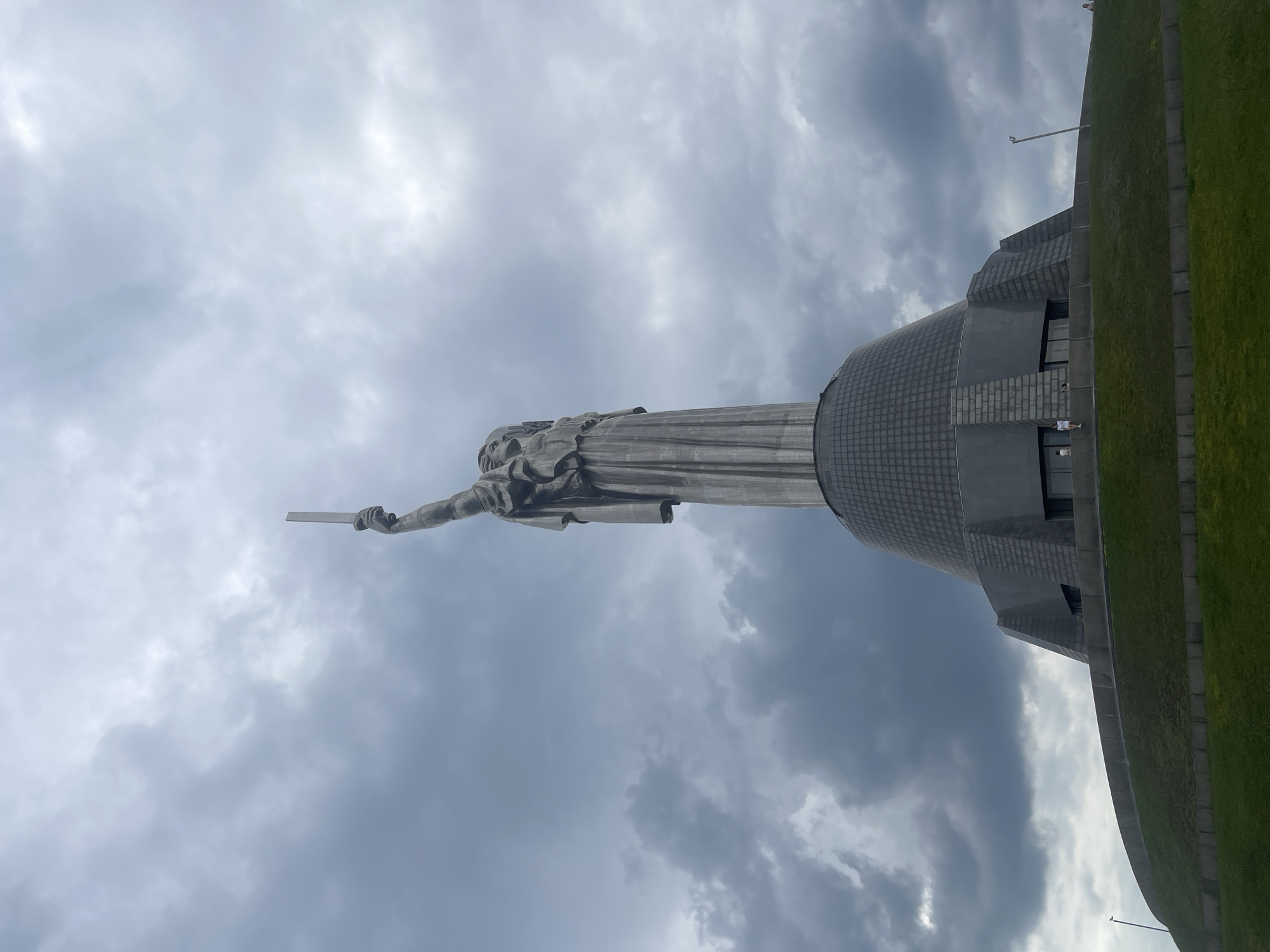 Kyiv's Motherland Monument observed under overcast skies