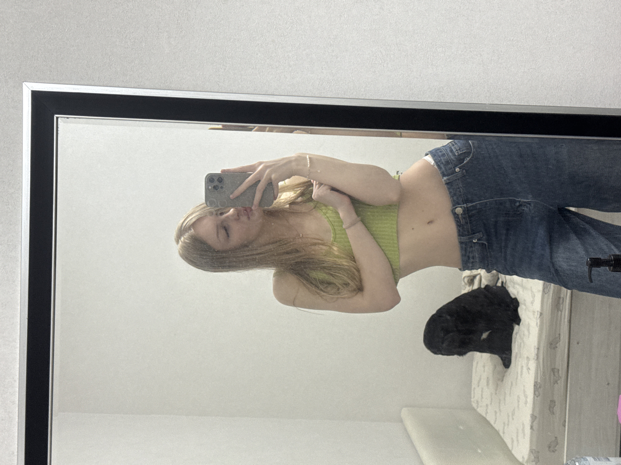 Mirror selfies and pet cuddles from a Perm apartment