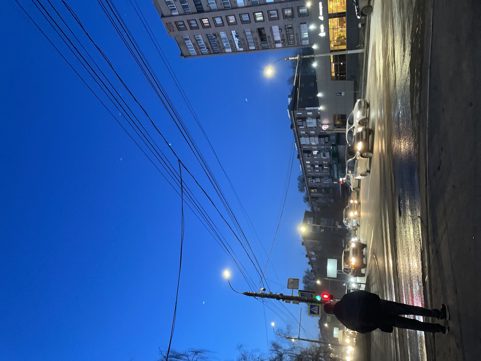 Evening street scenes documented across Izhevsk, Russia neighborhoods