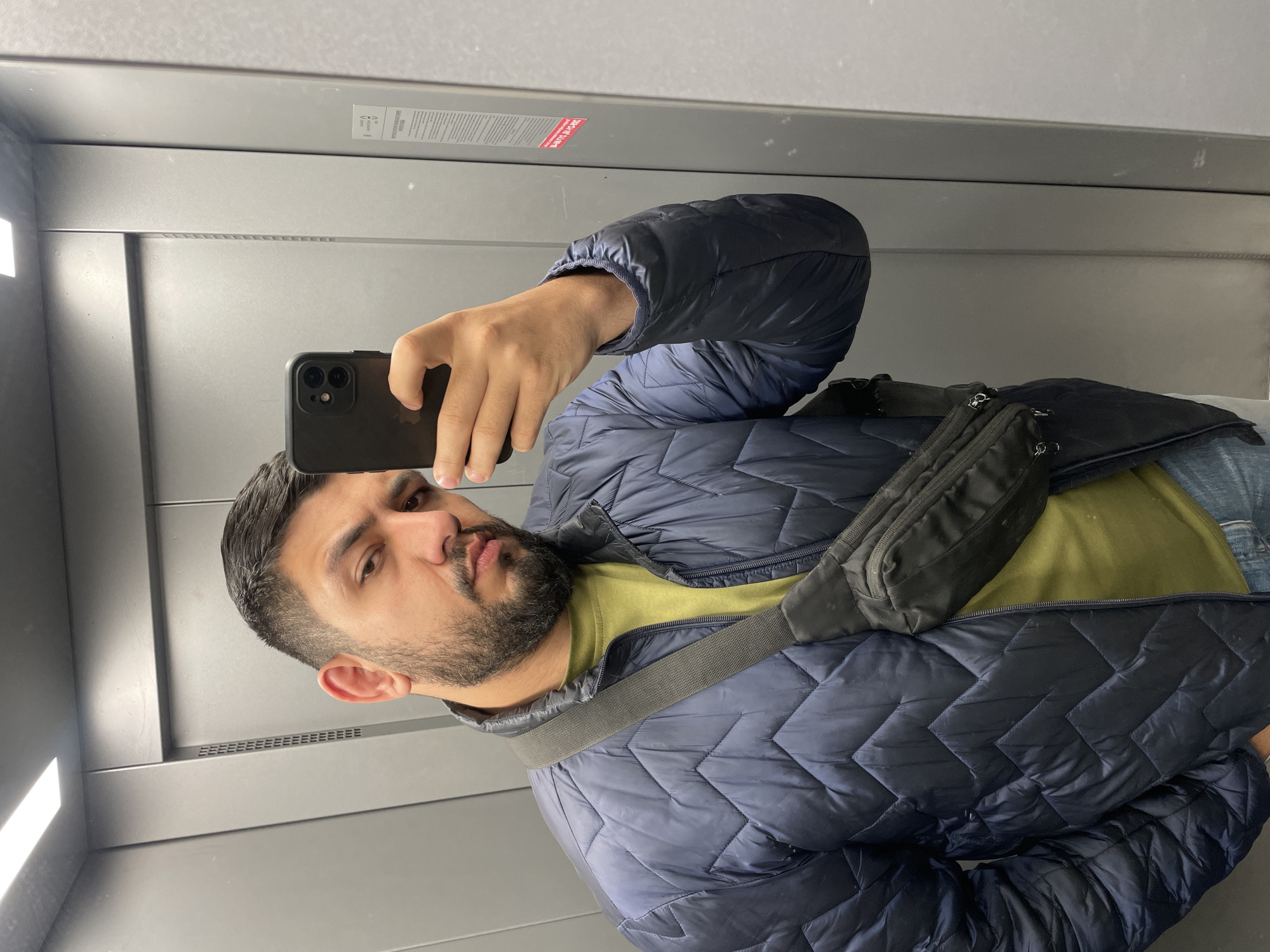 Man Takes Selfie in Elevator in Krasnoyarsk