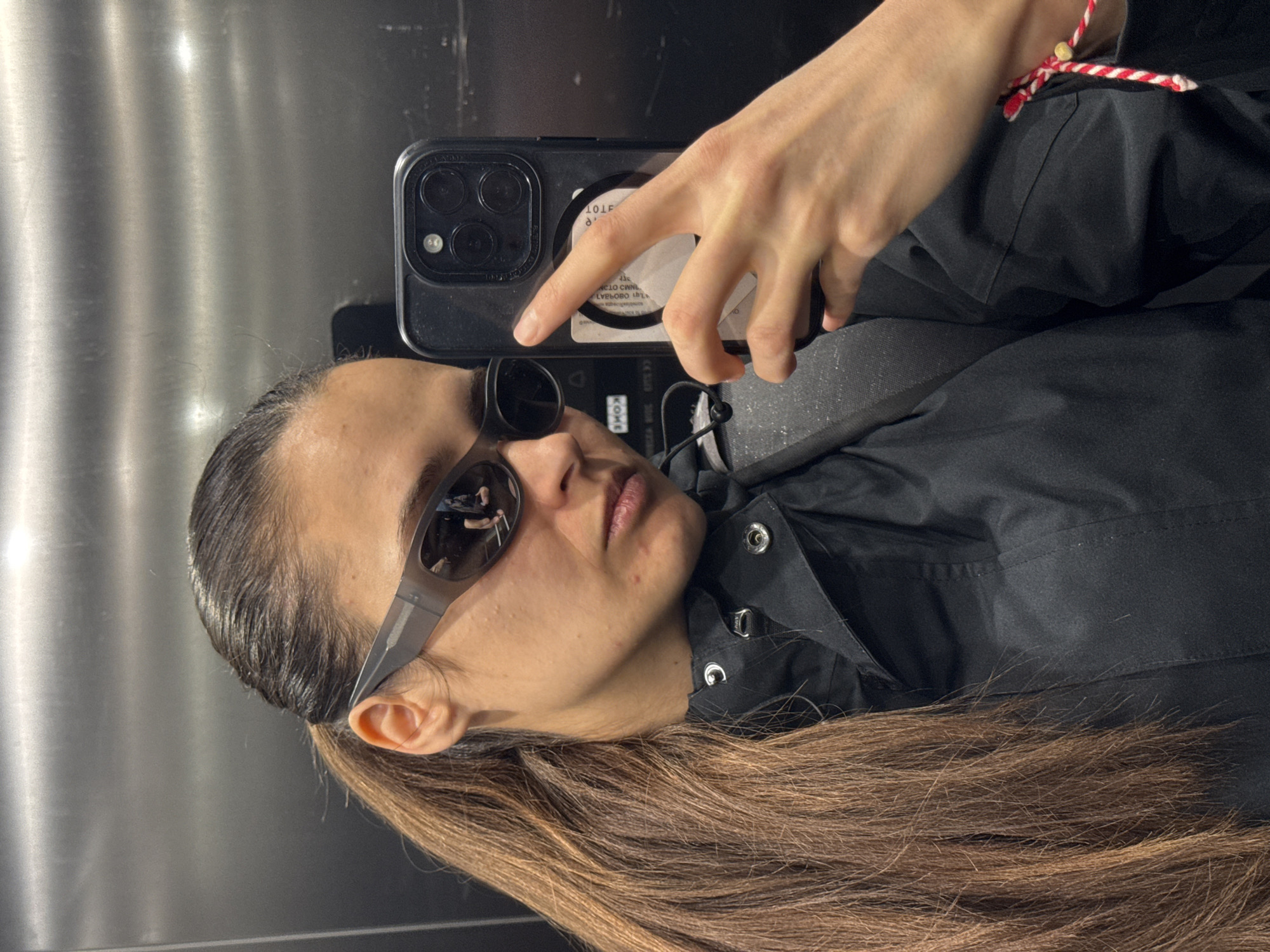Woman Takes Selfie in Mirrored Space in Copenhagen