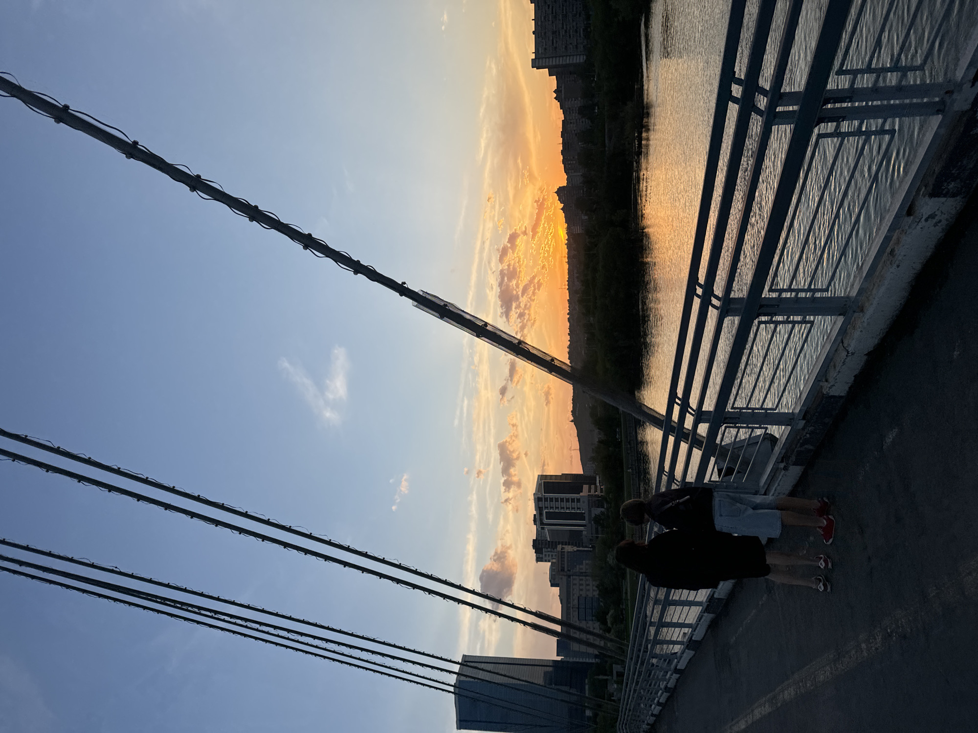 Afternoon gatherings documented along Krasnoyarsk riverfront and bridge areas