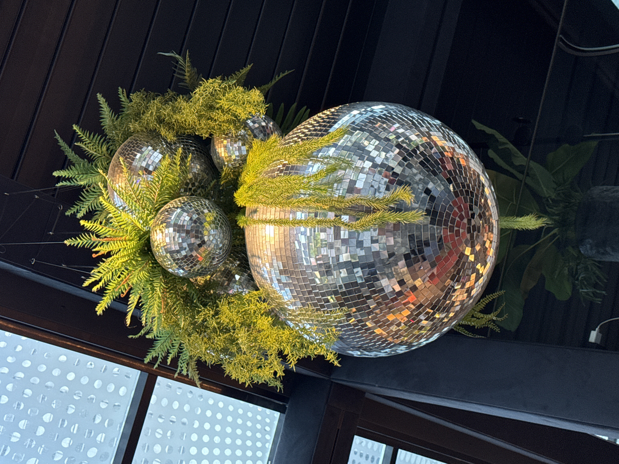 Disco balls and ferns create ceiling display in Varna
