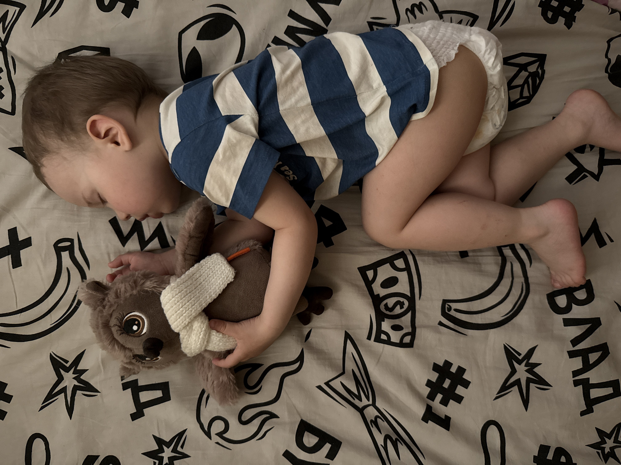 Quiet morning moments: sleeping child and woman documented