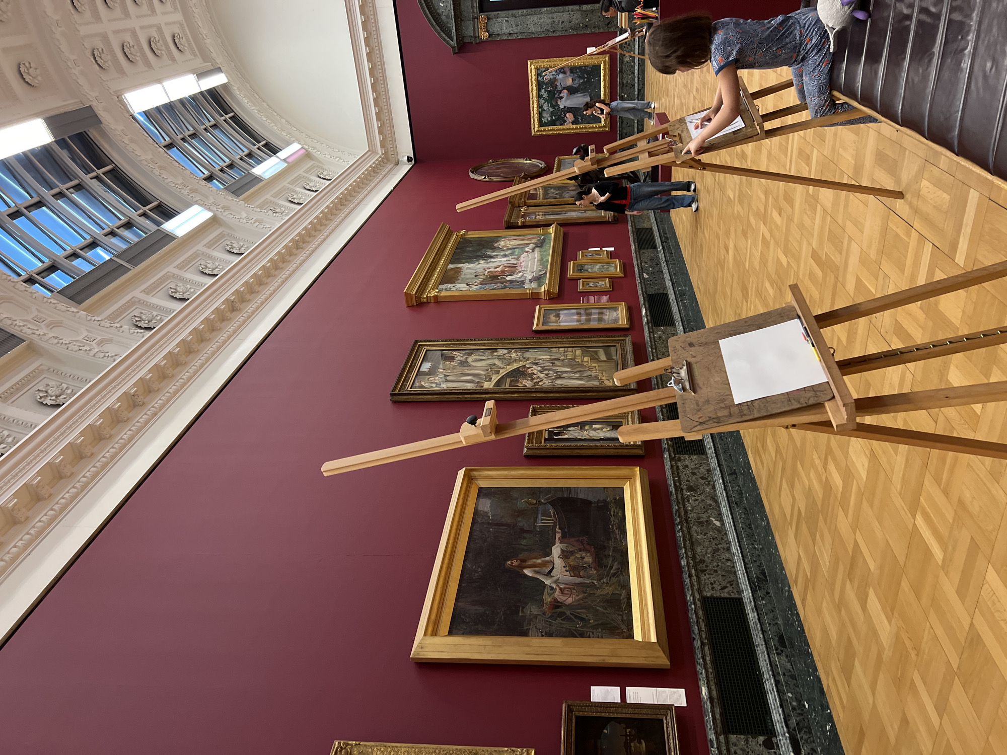 Art activities documented at London gallery with curved murals