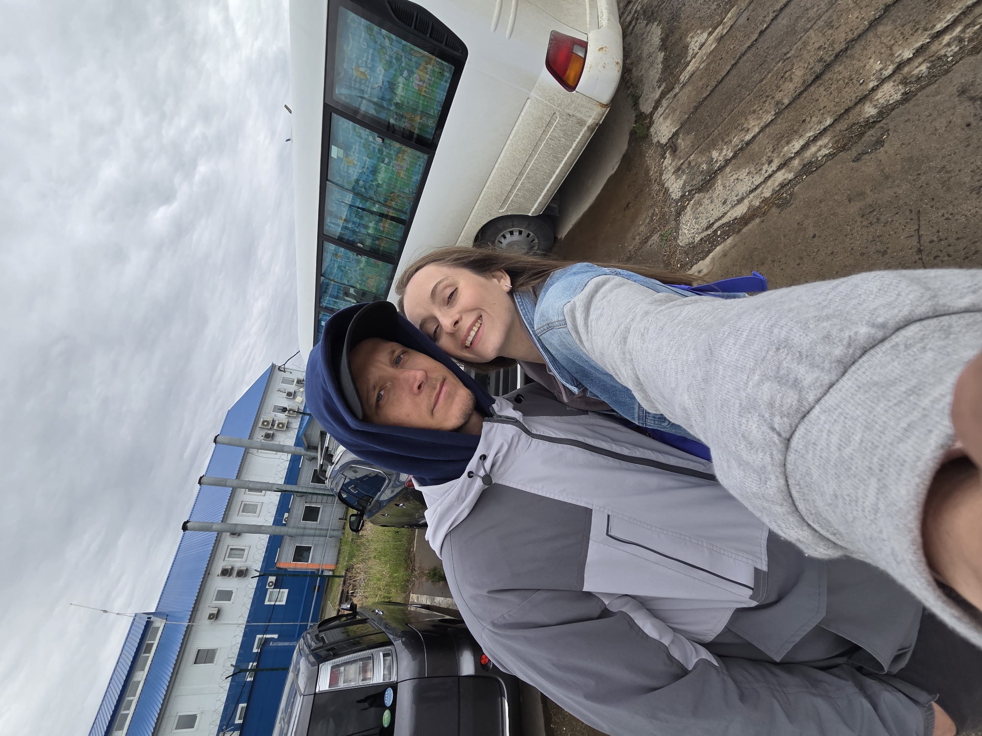 Couple documents overcast day outing in rural Russia