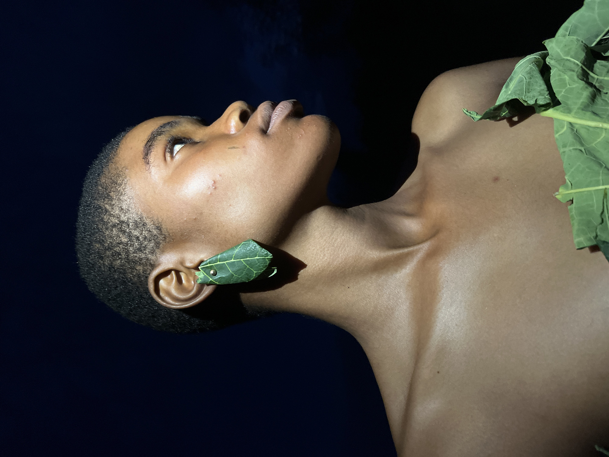 Creative leaf fashion shoot captured in Badagry, Nigeria