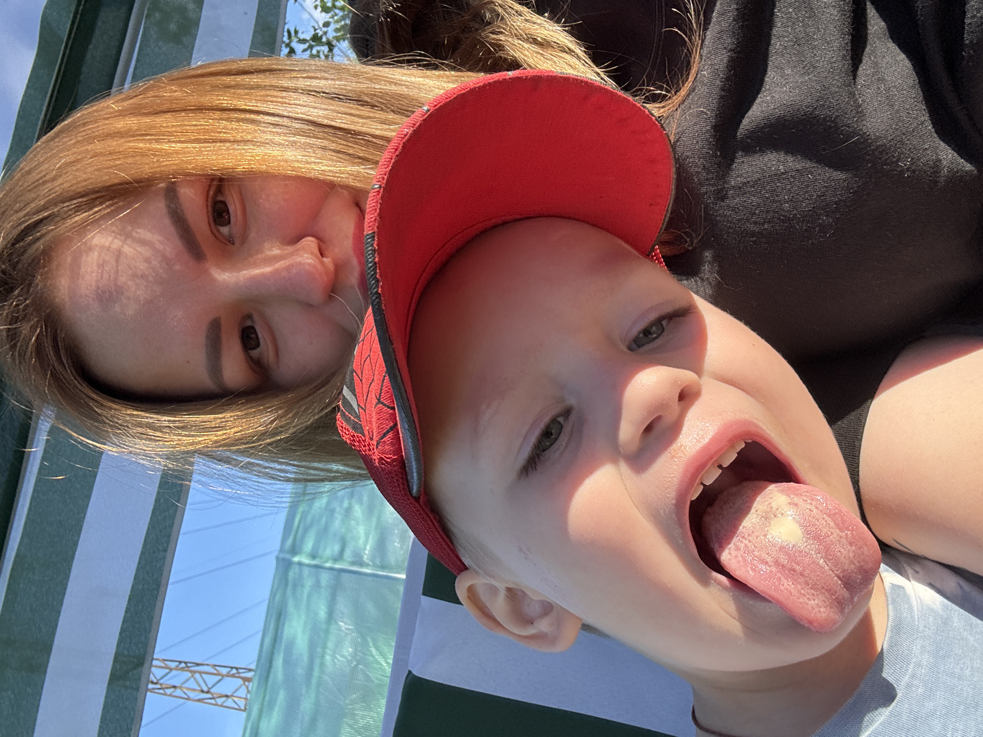 Mother, child enjoy sunny afternoon in Chaikovsky gardens