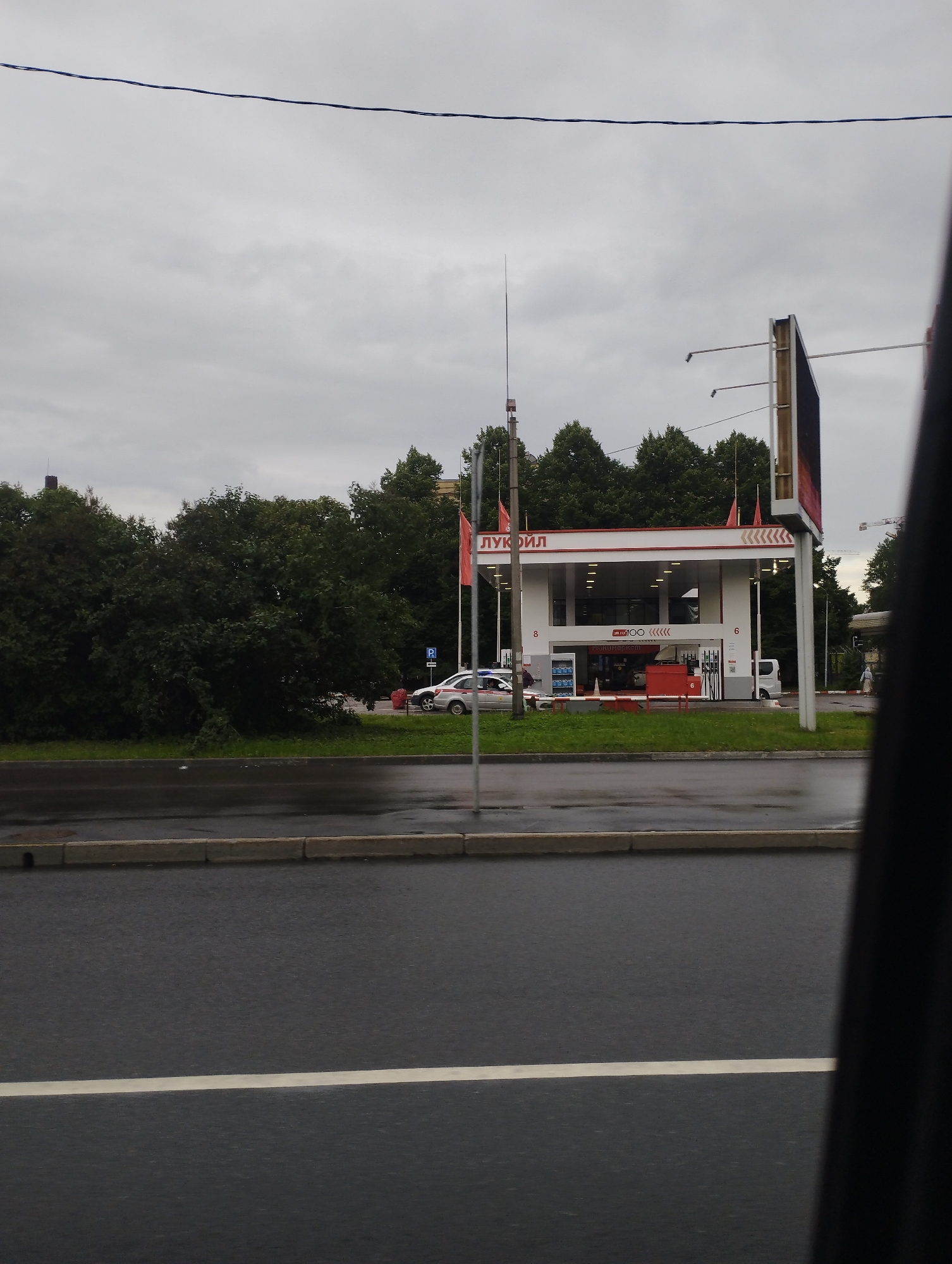 Rainy day traffic and street life in St. Petersburg