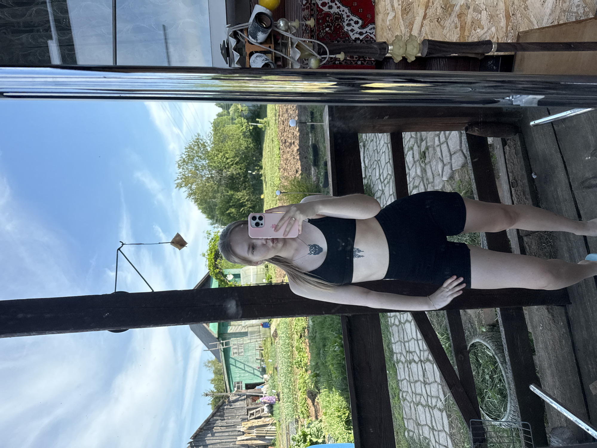 Woman takes selfies with dog in rural Russia