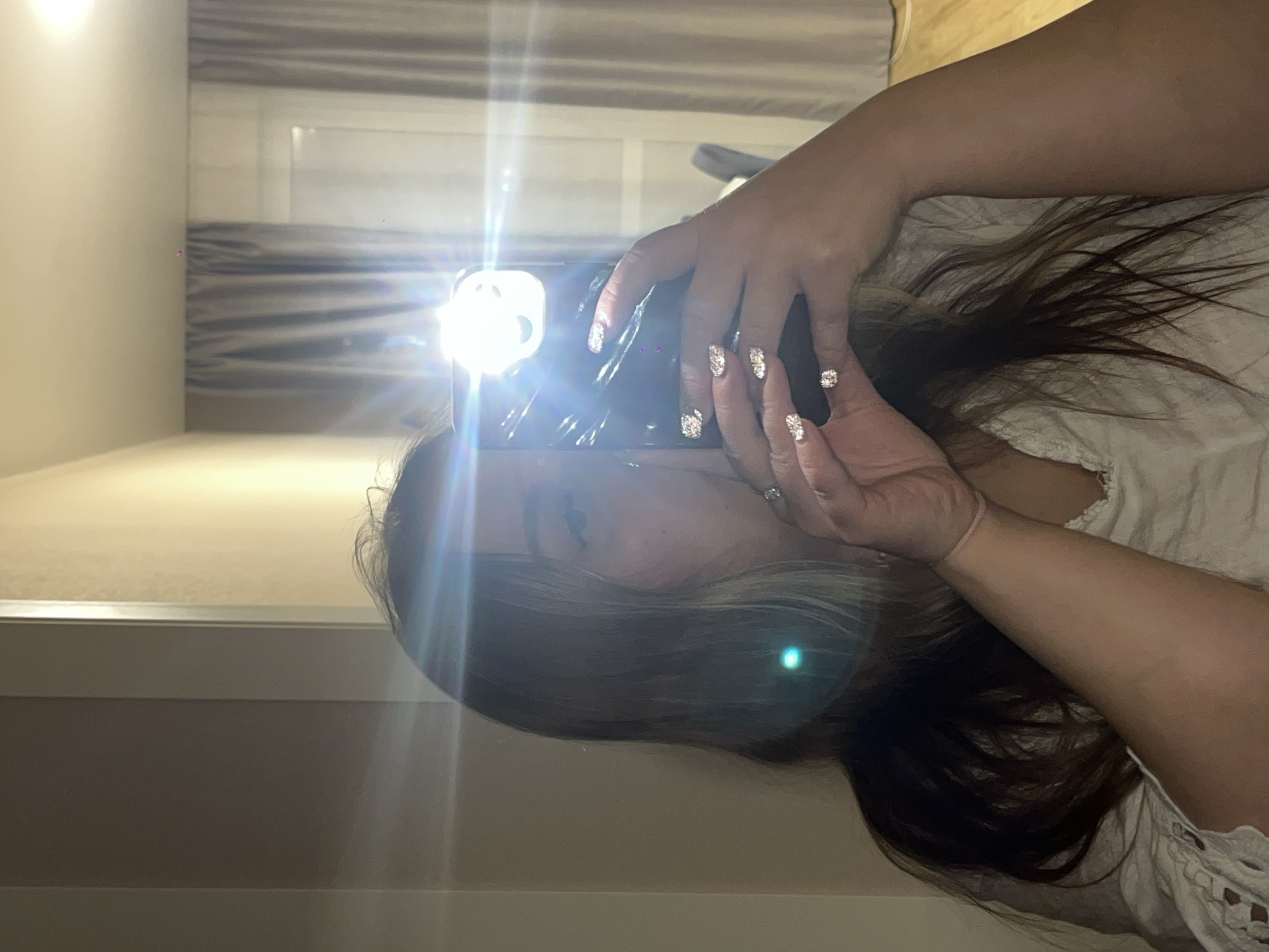 Woman takes selfies indoors in Krasnodar, Russia