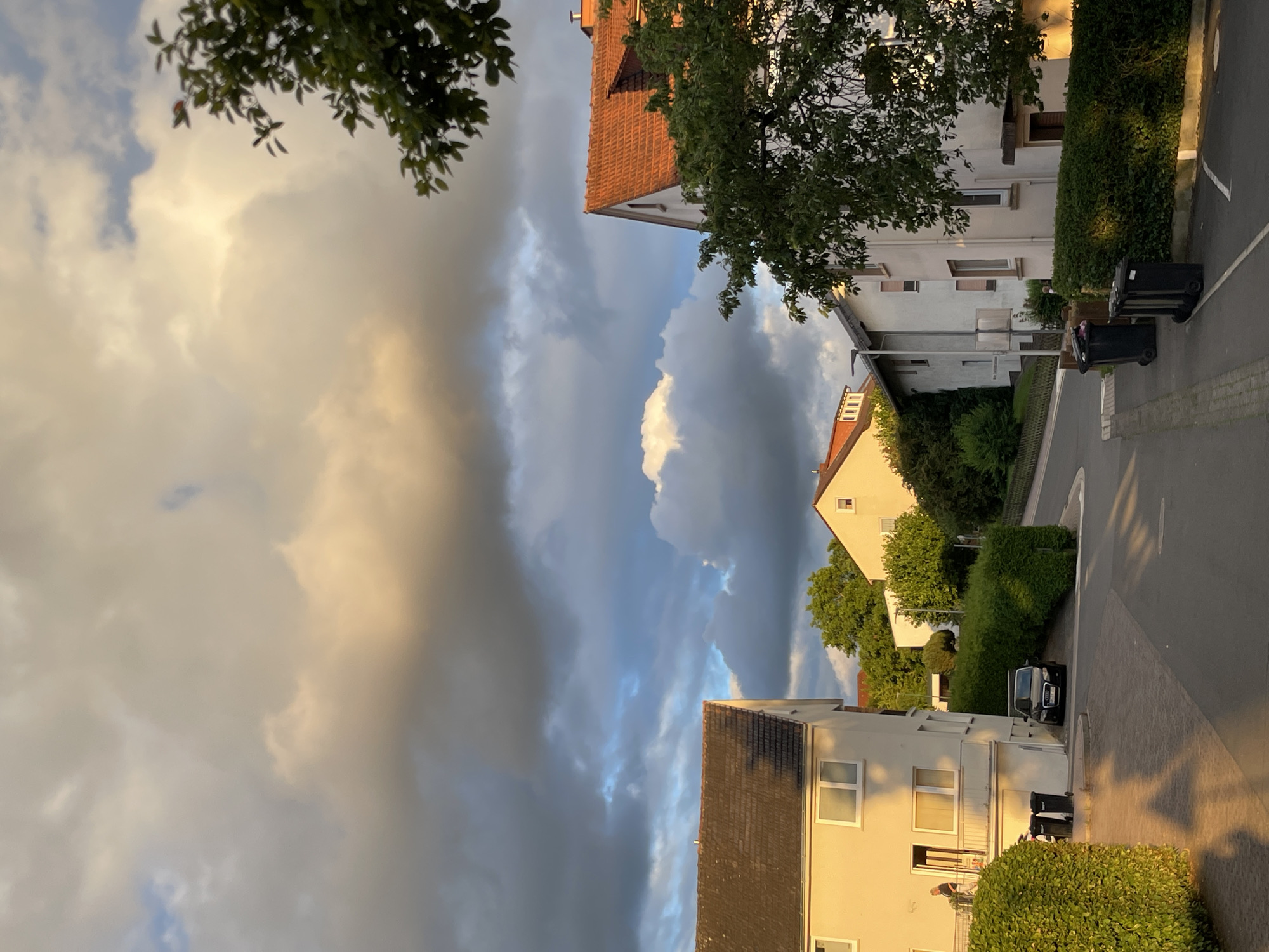 Golden and stormy skies collide over Neukirchen neighborhood