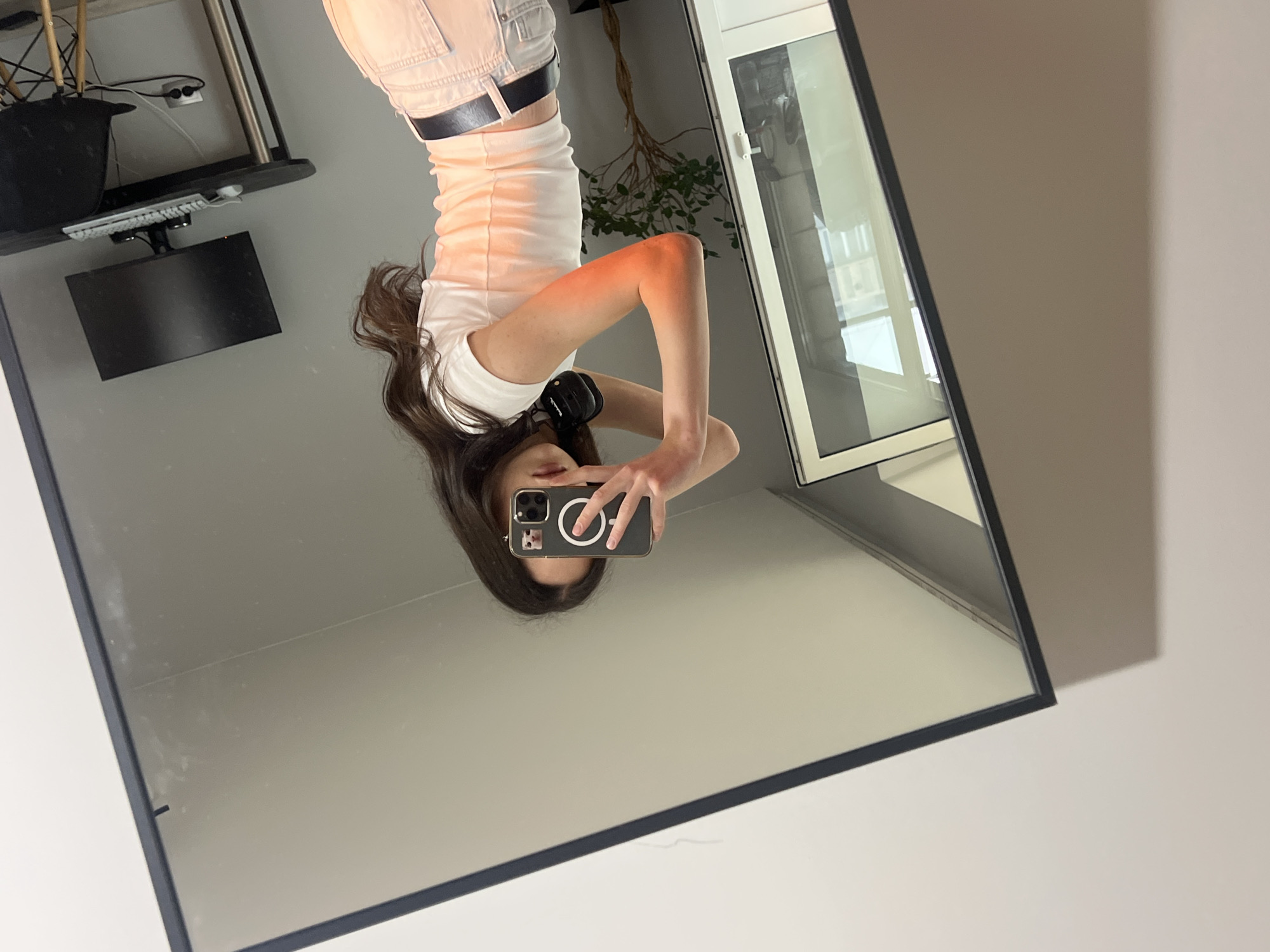 Person takes mirror selfies in Ternopil, Ukraine room