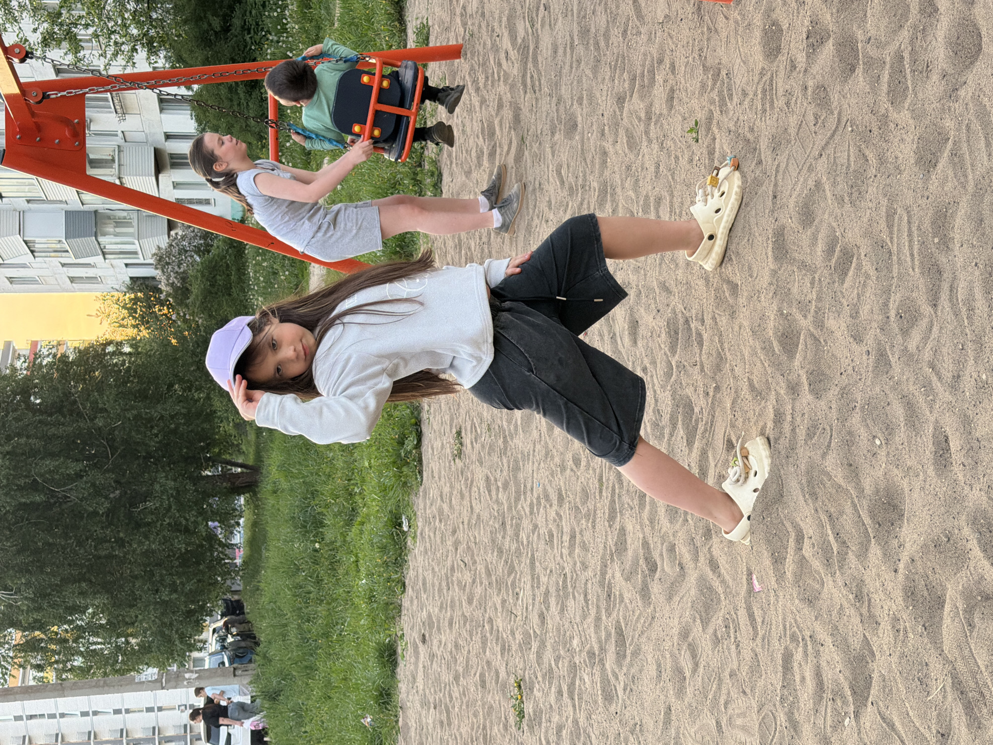 Families enjoy afternoon playground time in Chaikovsky, Russia