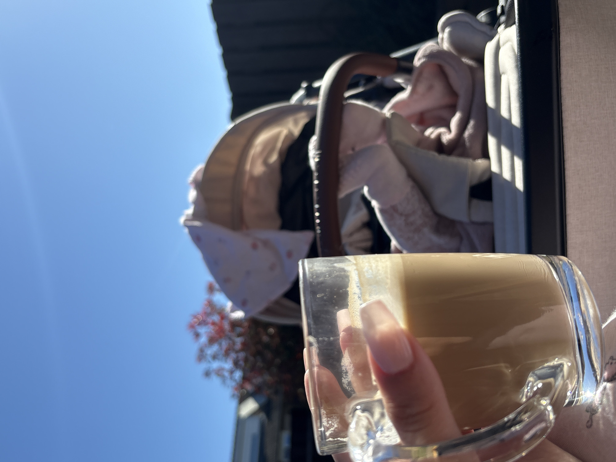 Morning coffee break with baby stroller in Veghel