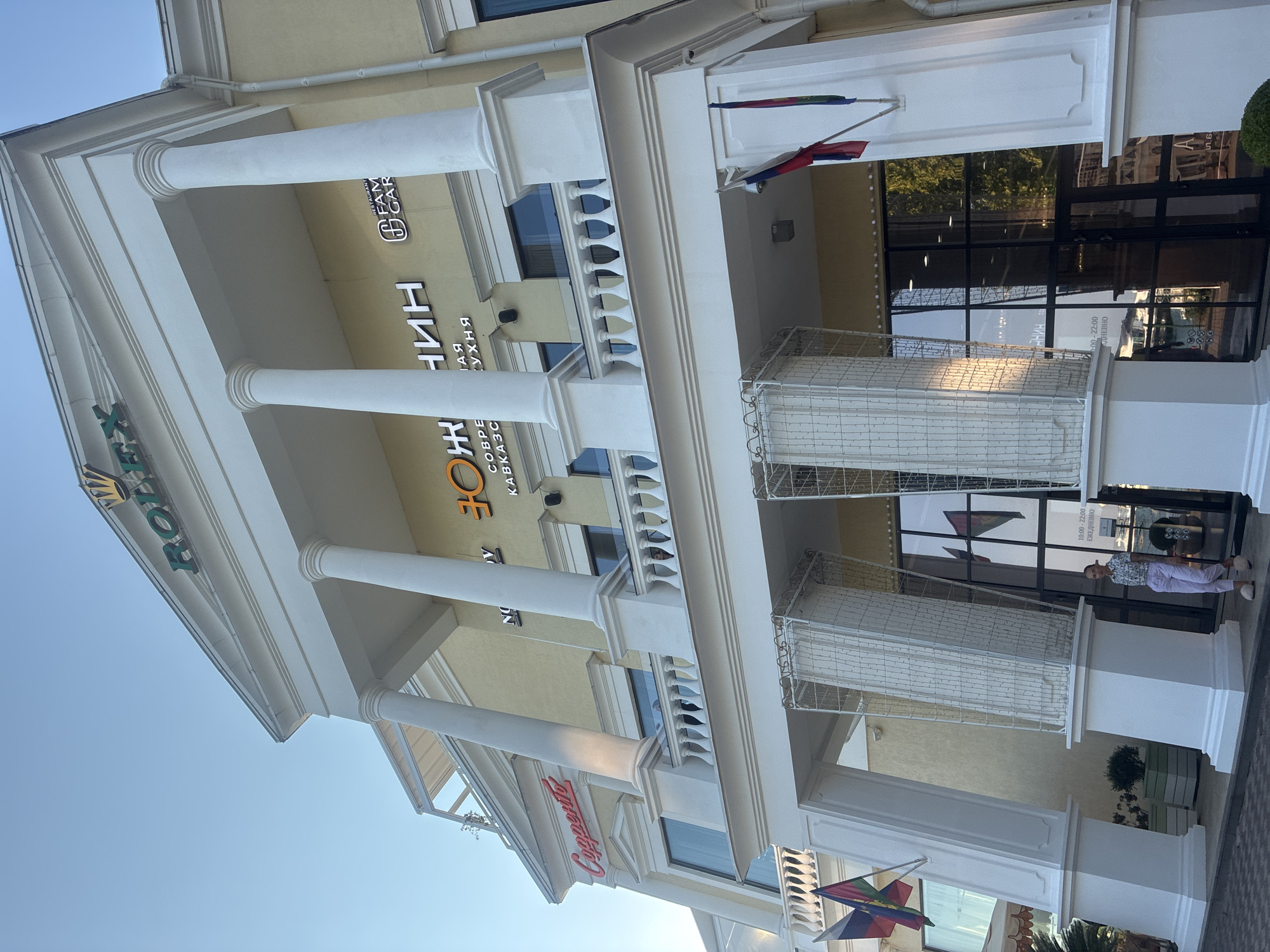 Afternoon stop by a classical building in Sochi